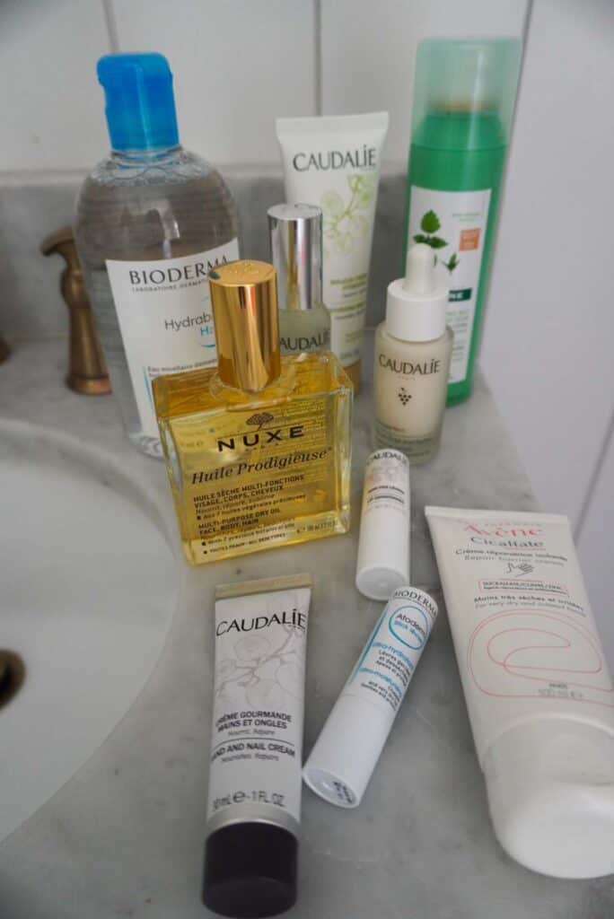 French beauty products sitting on a counter 
