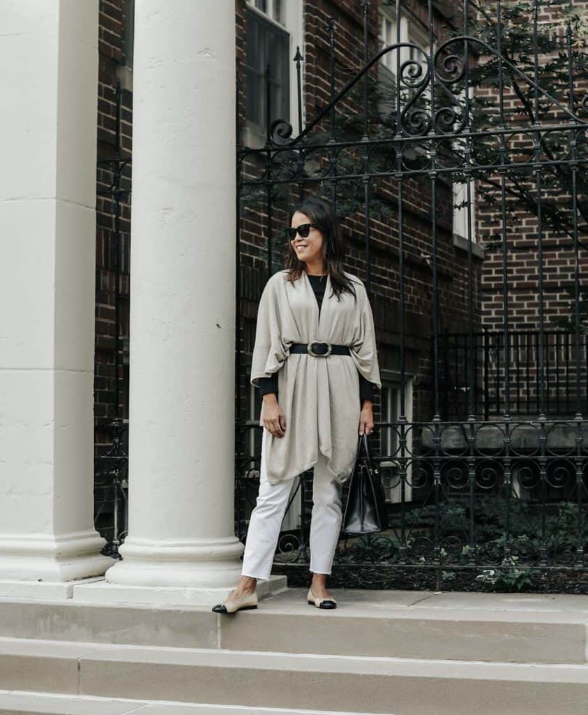 standing wearing mer sea wrap with belt and flats