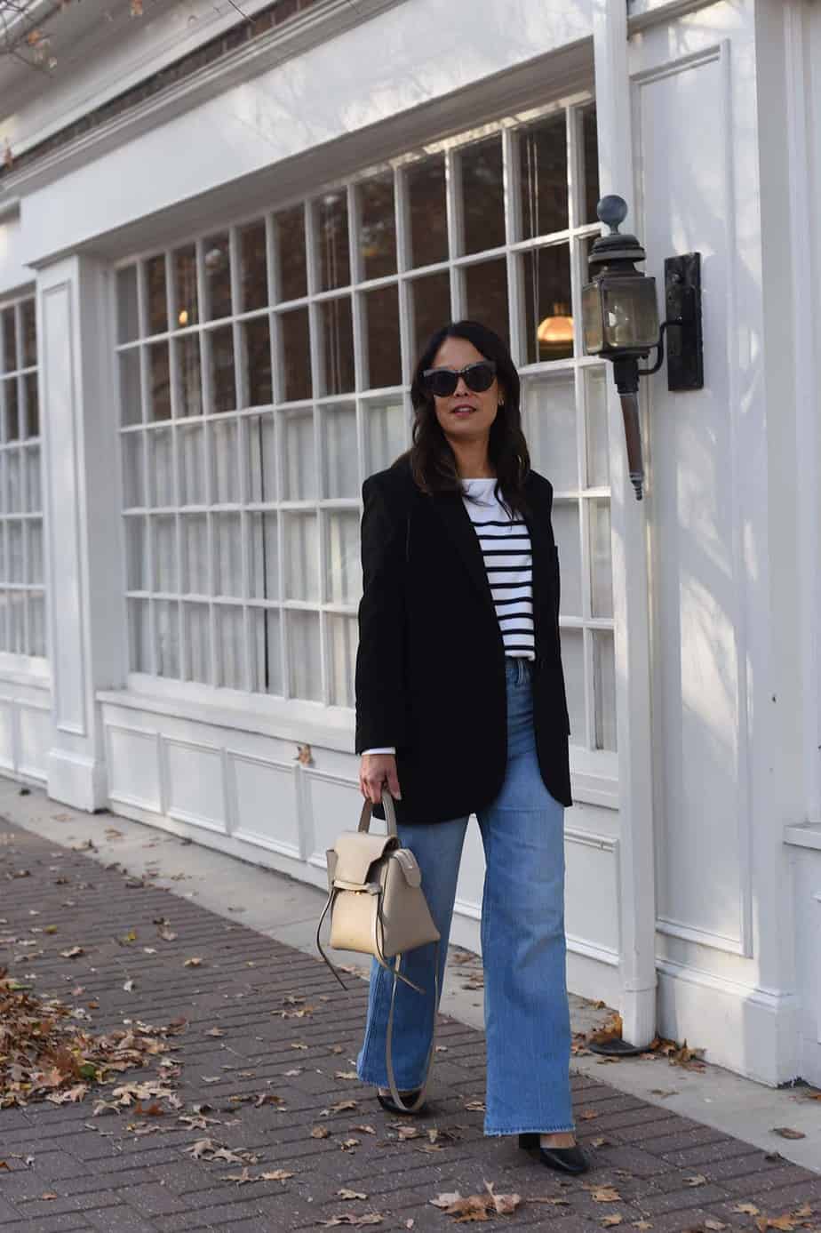 stripe top with flare jeans Wearing stripe top with flare jeans and grey handbag