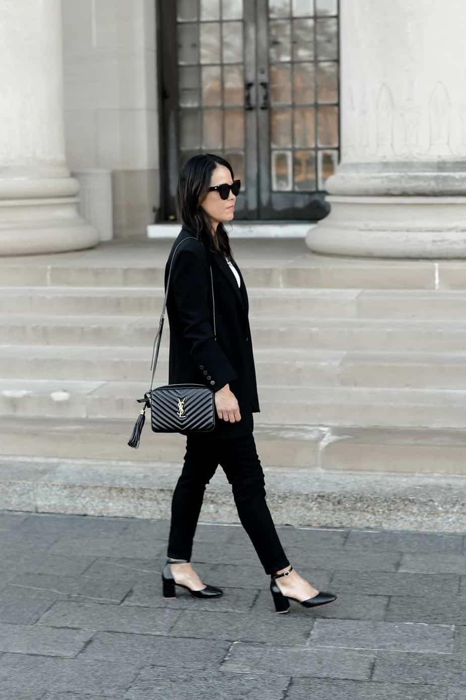 Classic Wardrobe of black jeans, white tee, black pumps, and black handbag