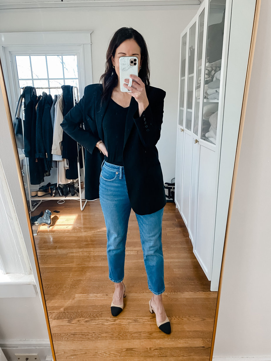 Wearing black blazer, jeans, and flats