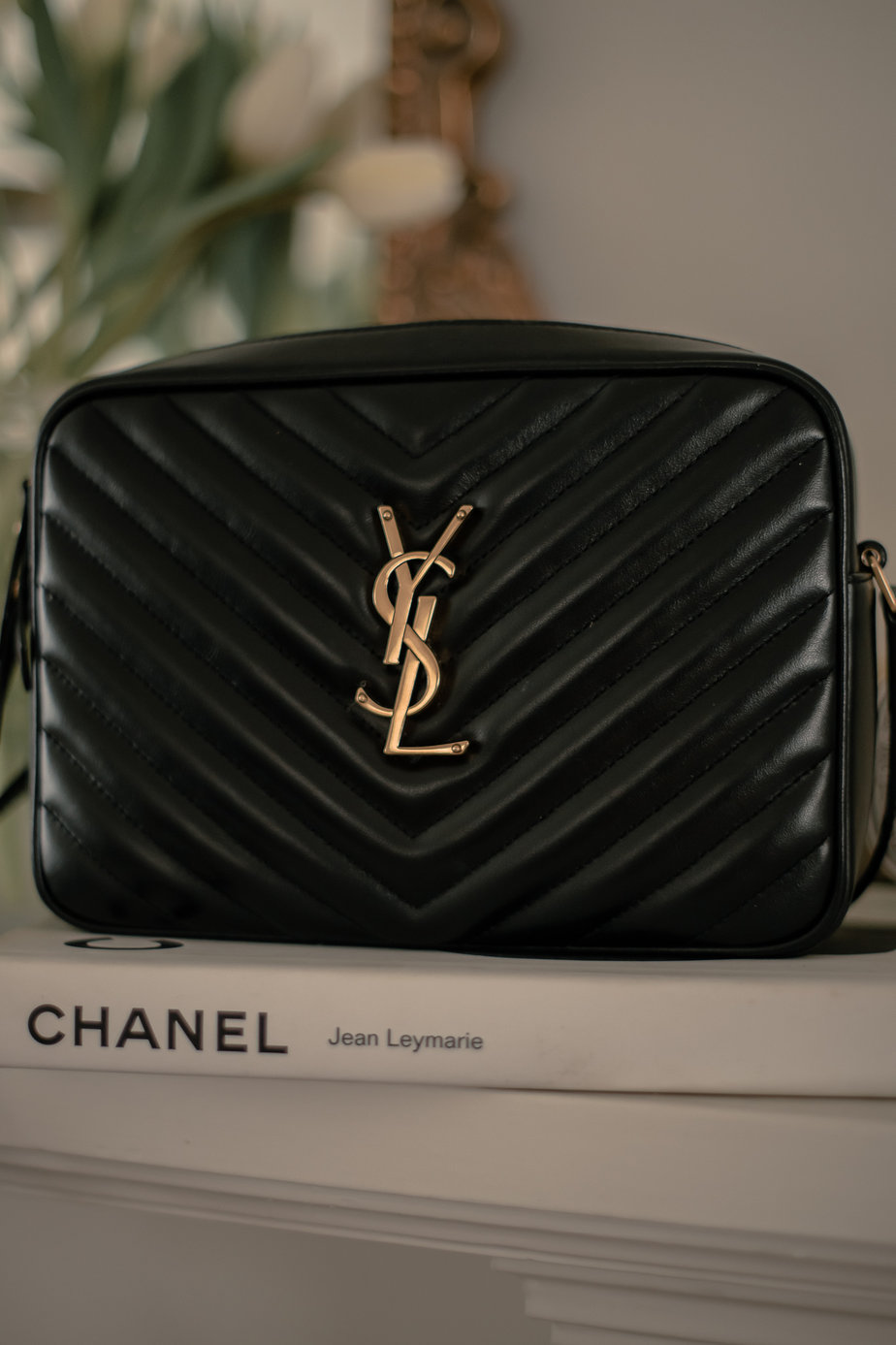 up close of ysl black handbag 