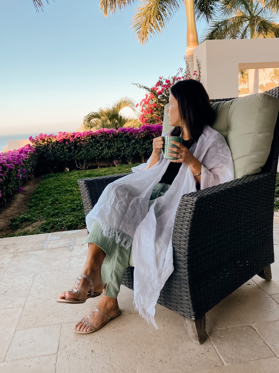 wearing mer sea white wrap sitting outside in mexico