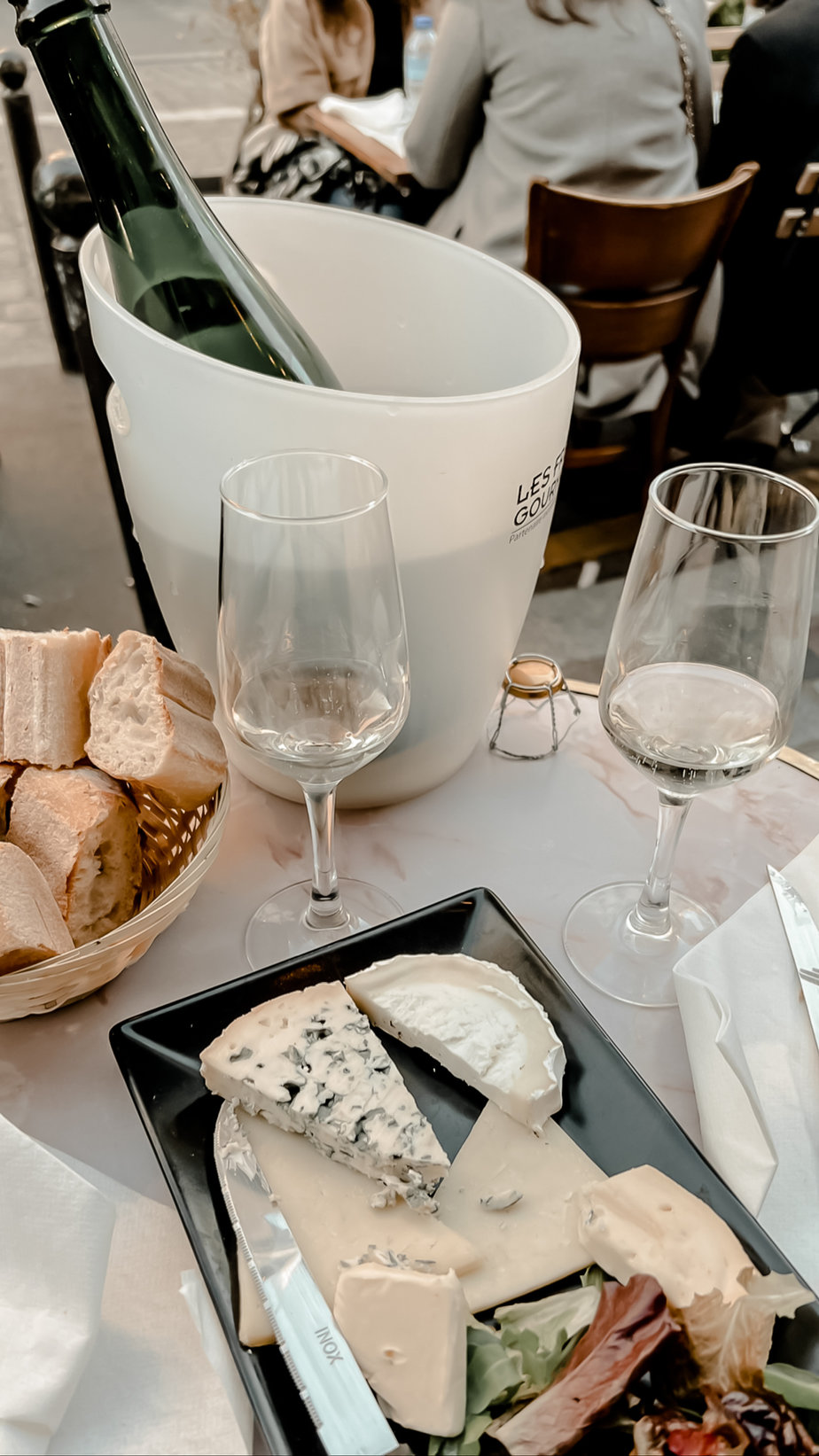 wine and cheese on table
