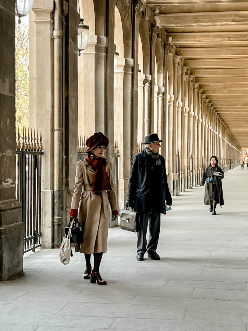 a couple walking the streets of Paris 