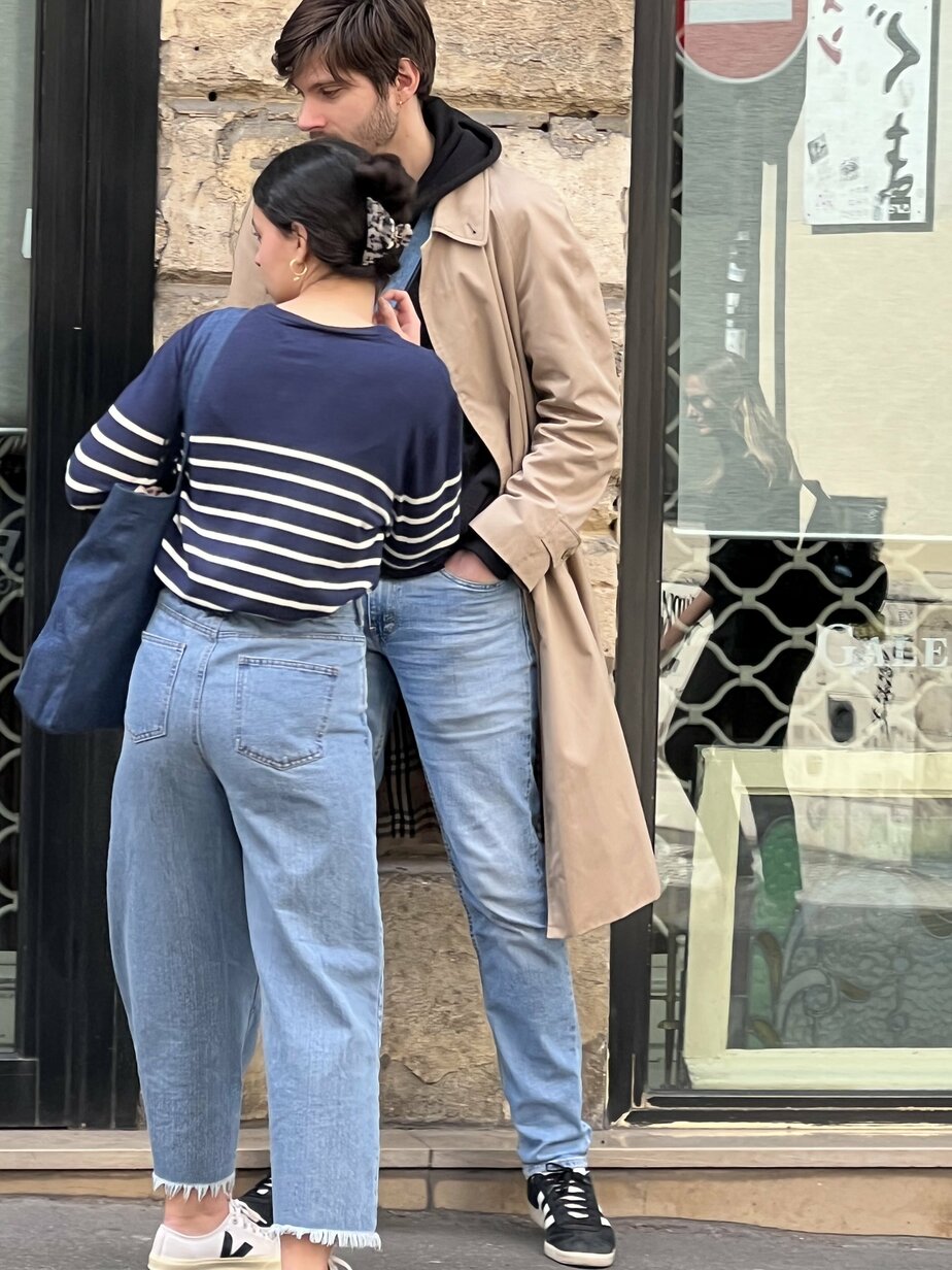 guy and girl talking in paris guy and girl talking in paris