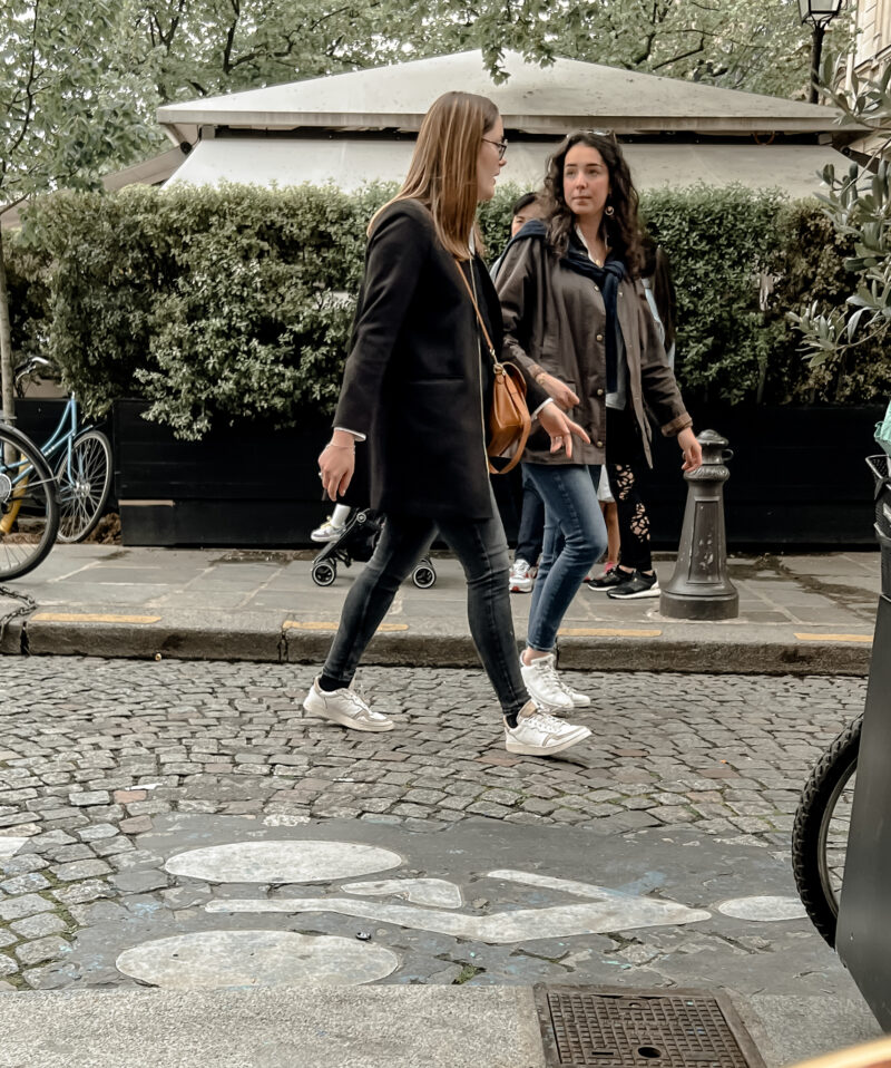 two ladies walking in paris 