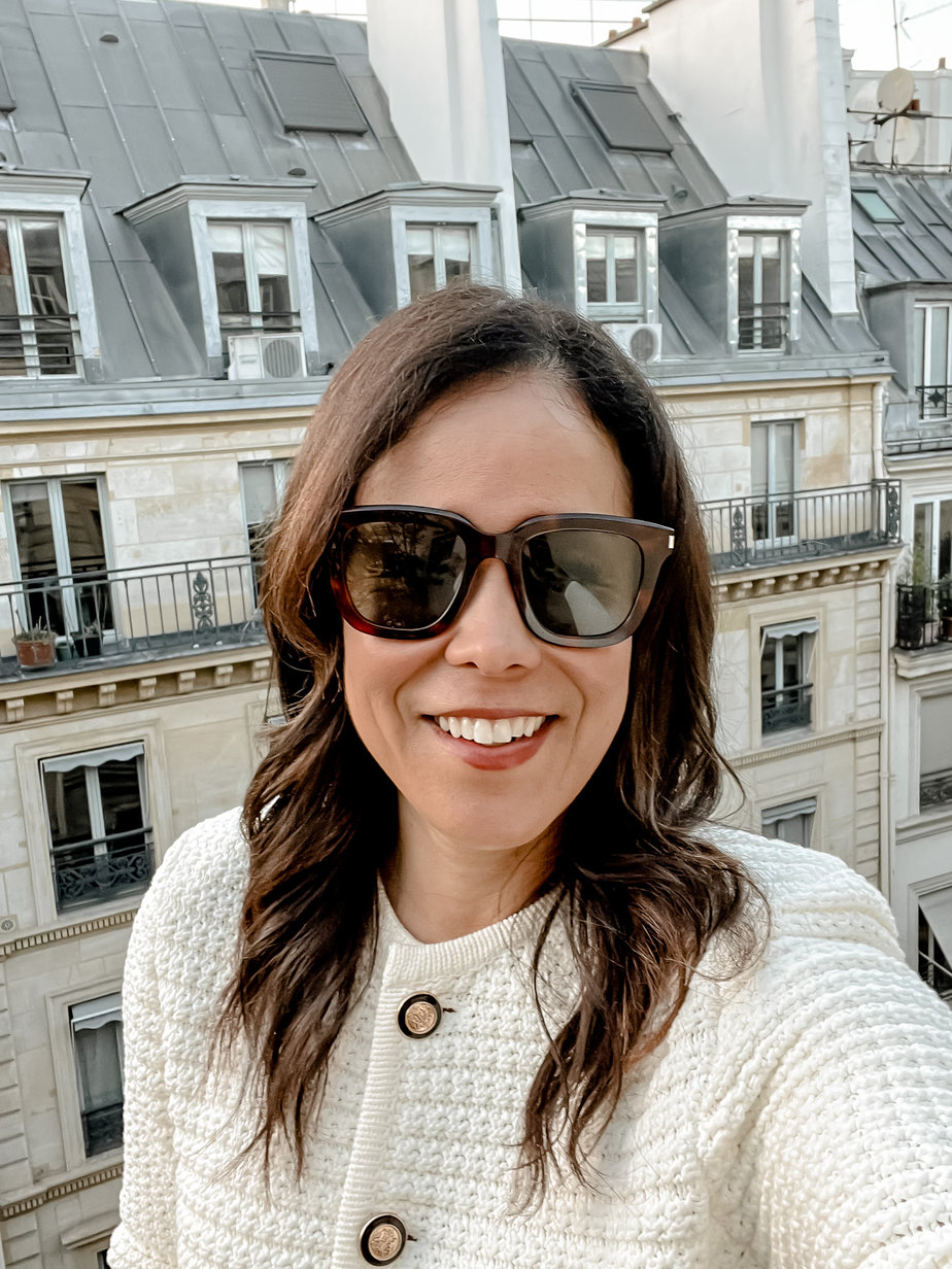 selfie with paris facade in background