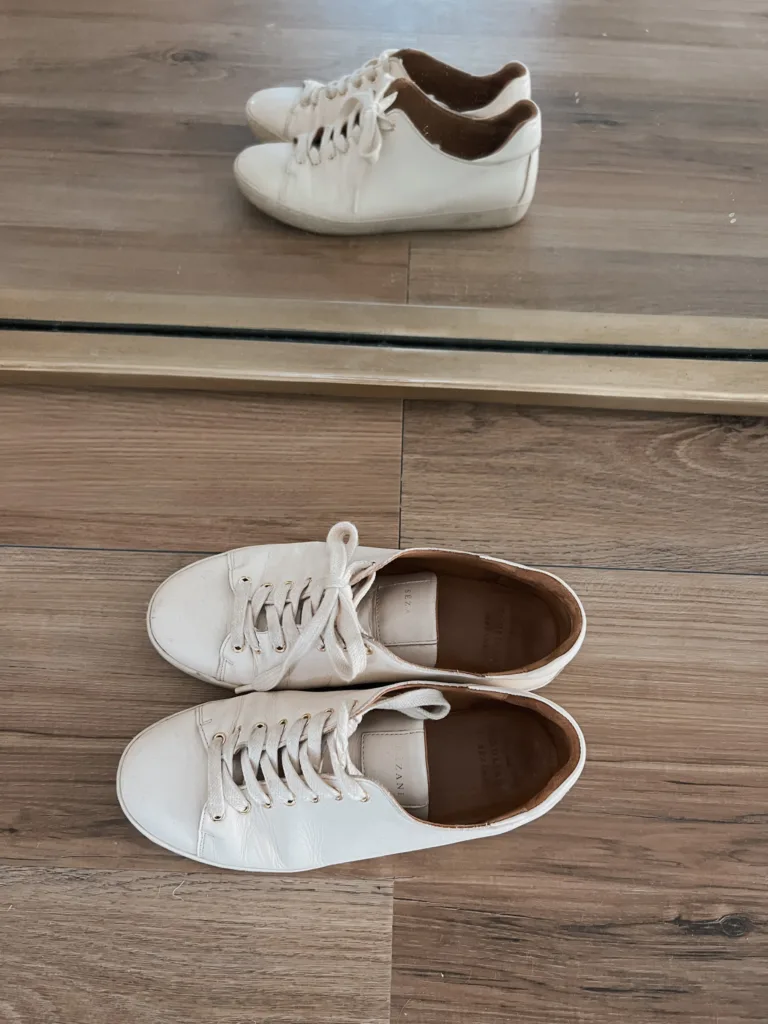 Sezane jack trainers sitting on the floor