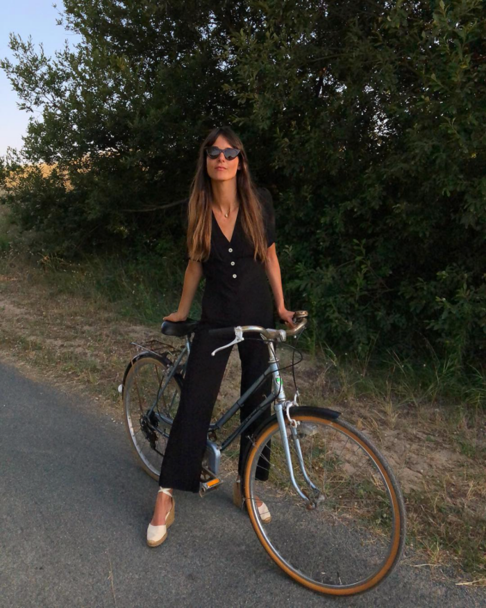 leia feiz on a bike in all black | French Girl Summer