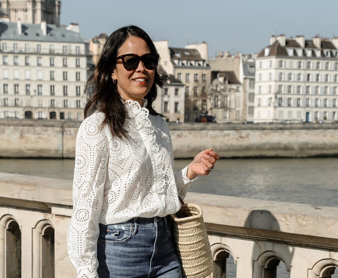 Wearing sezane shirt walking on bridge in paris