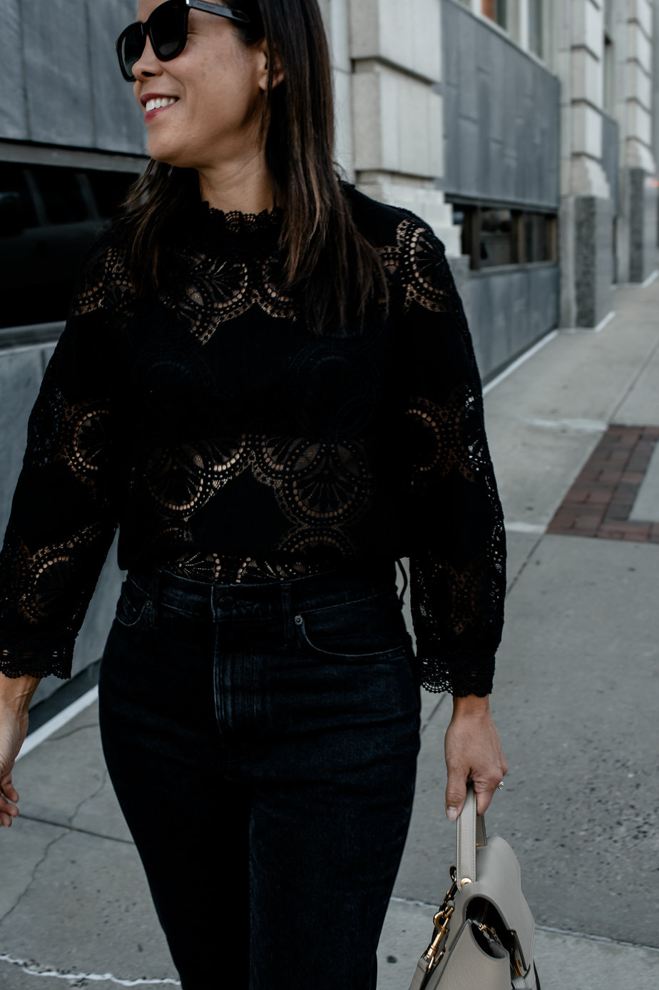 Walking down the street in black top
