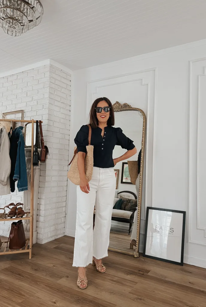 navy shirt with white denim Woman wearing navy shirt with white denim and sandals.