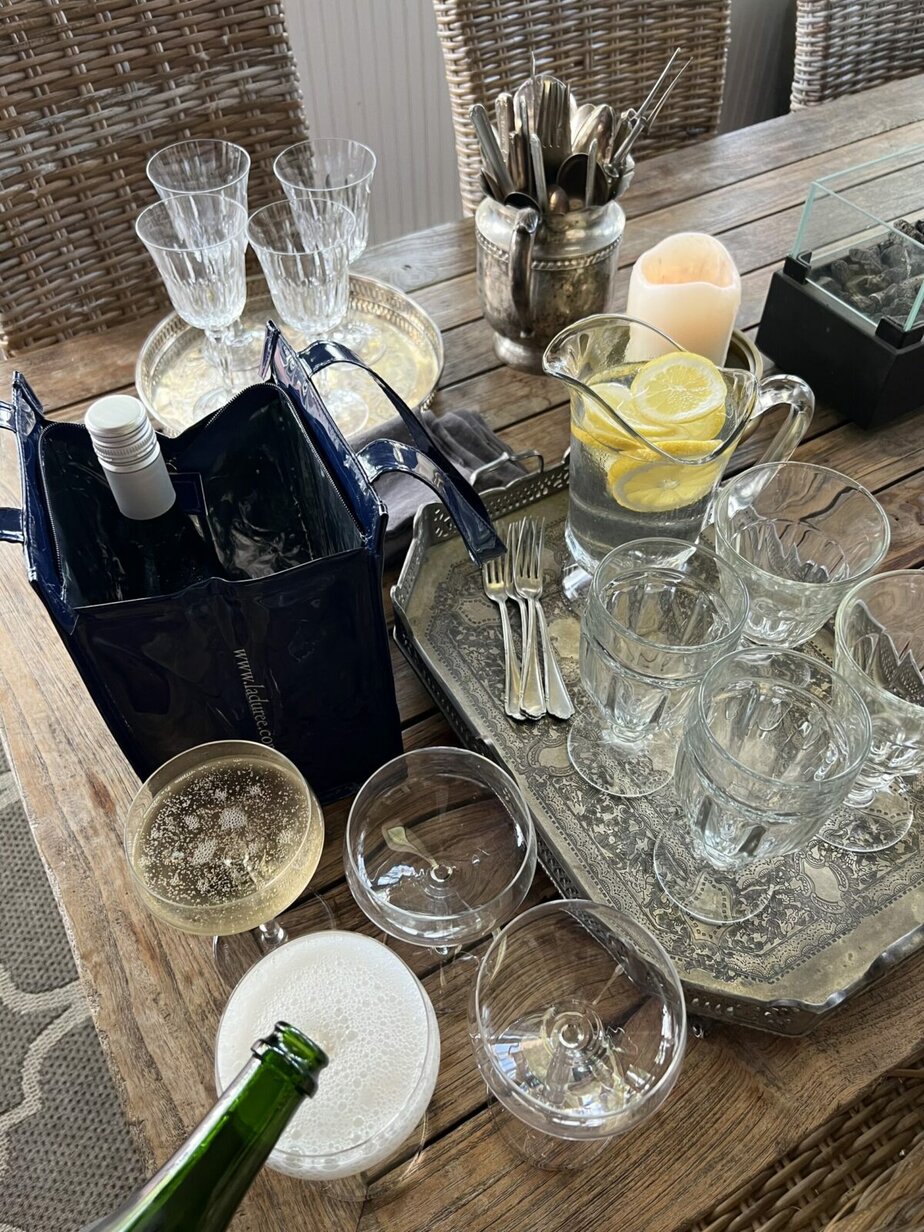 Glassware sitting on a kitchen table.