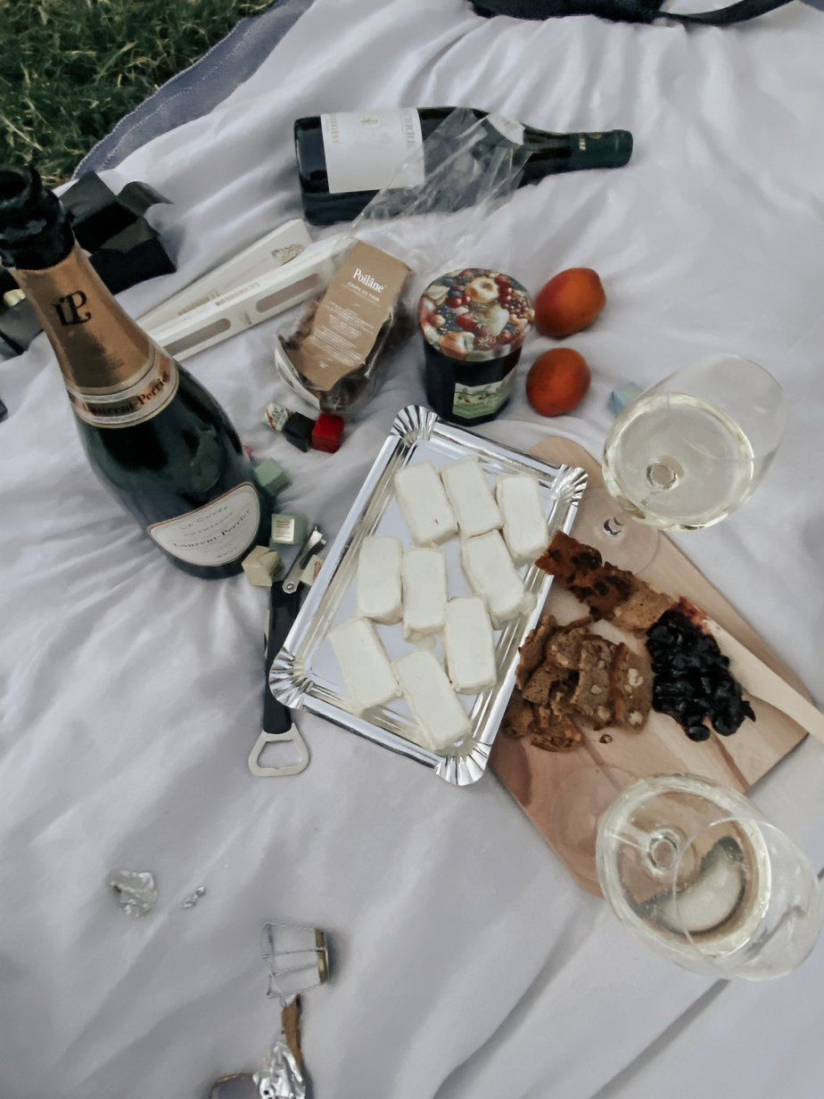 Picnic Food Items On A Blanket At Eiffel Tower