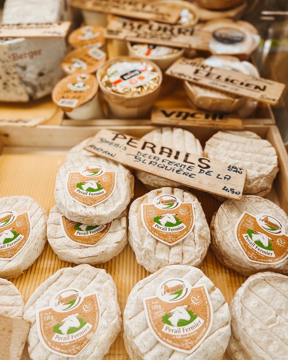 Little rounds of cheese at a French market.