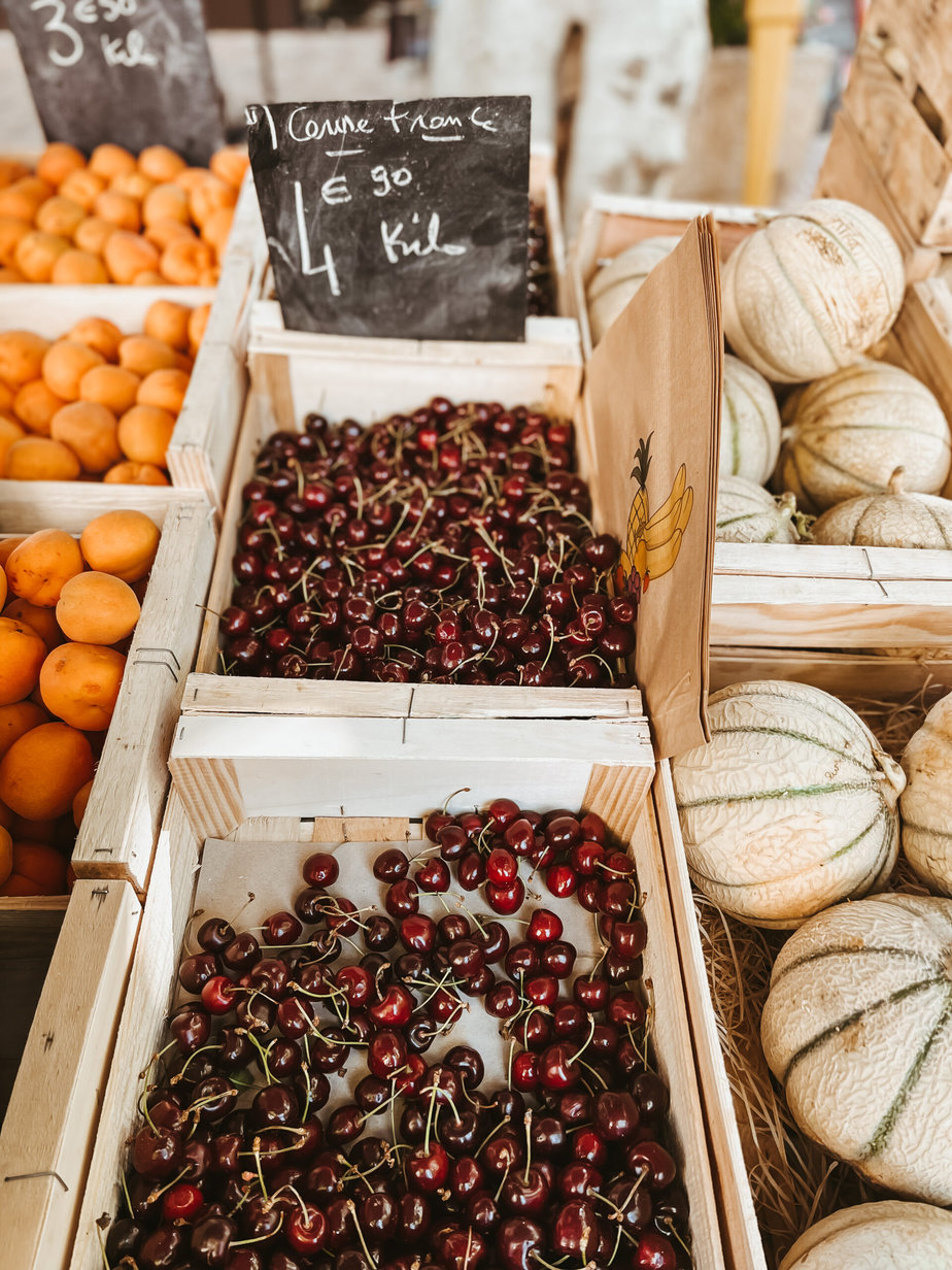 Fresh cherries and fruit at a farmers market in Provence