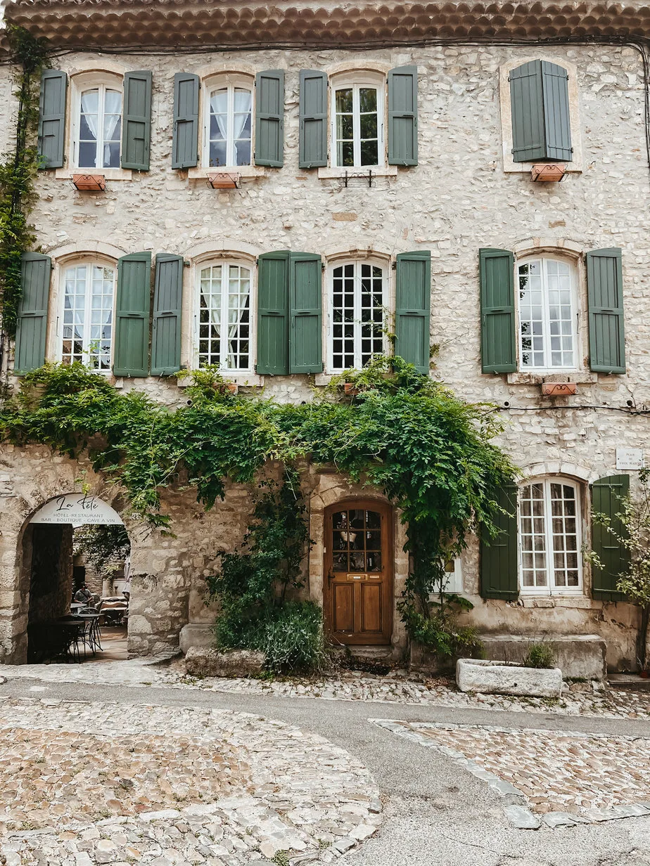 Green shutters on house in Provence