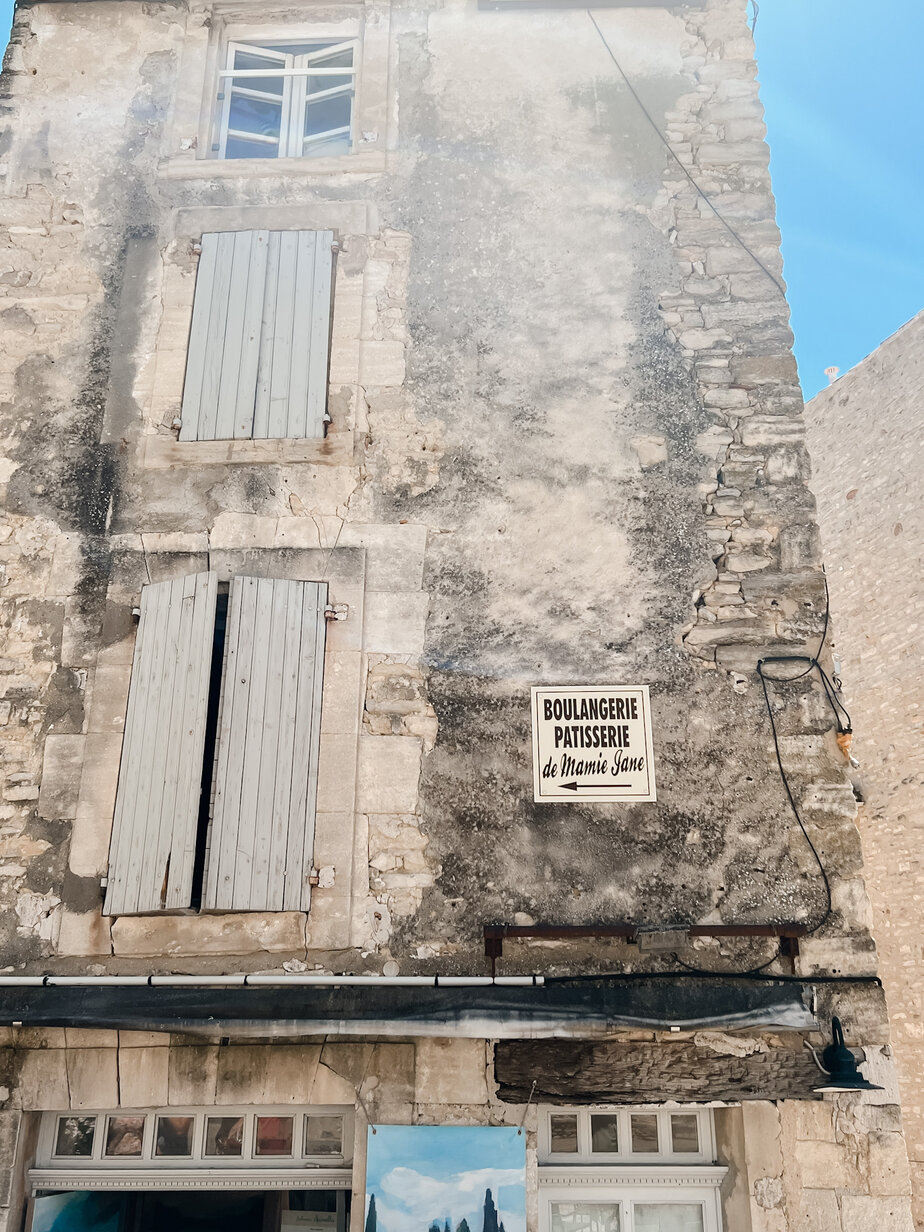 blue shutters in Gordes Provence Building with blue shutters in Gordes Provence