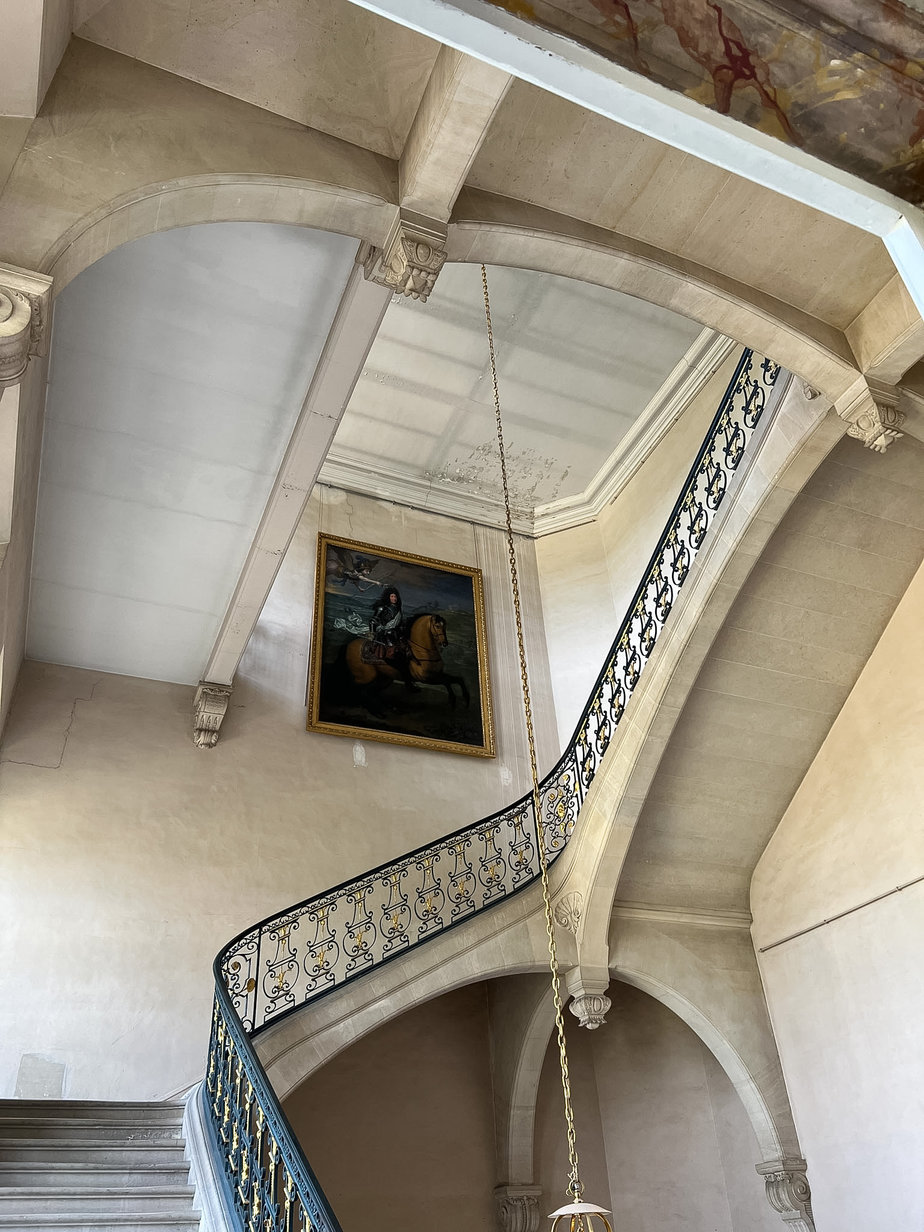 Versailles looking up staircase Inside interior of Versailles looking up staircase