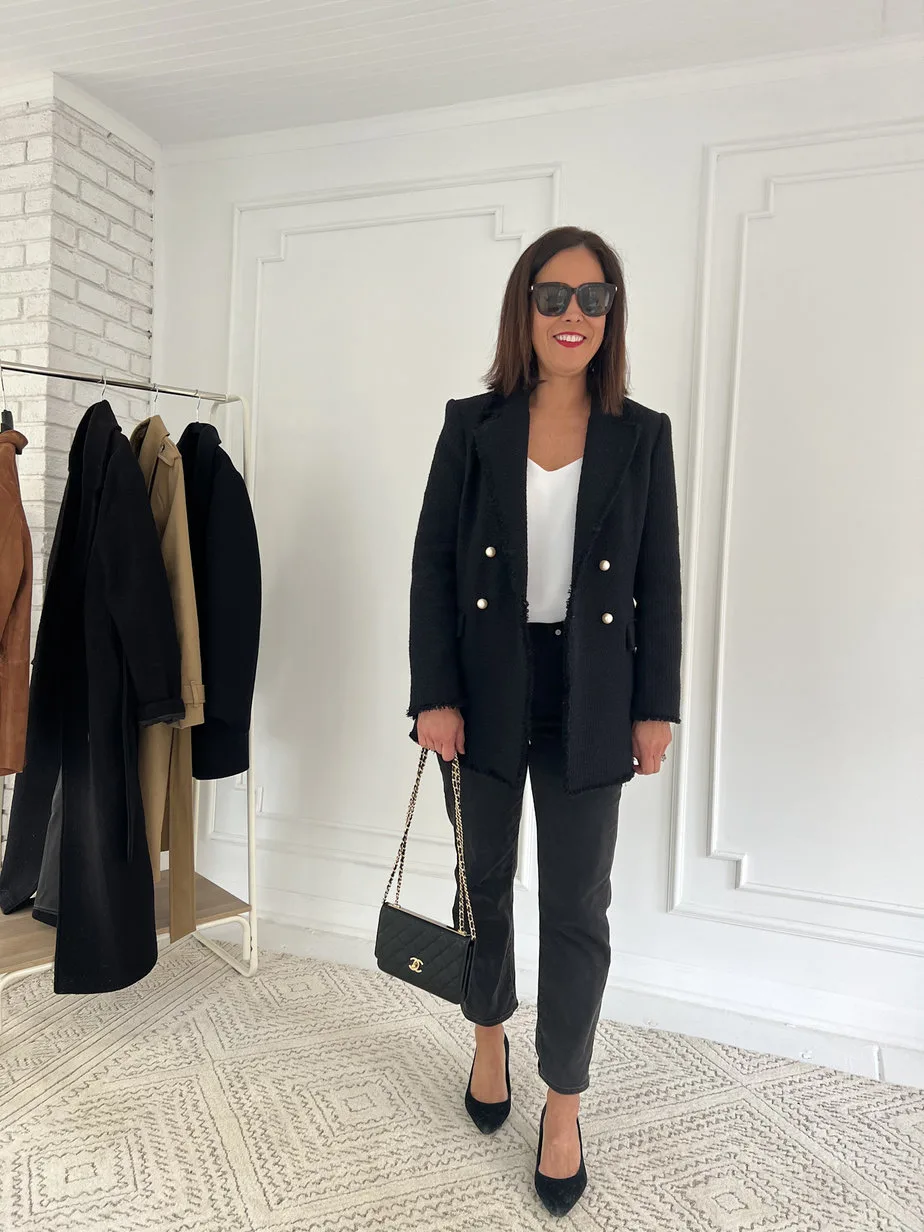 Wearing tweed blazer, jeans, black pumps and chanel bag.