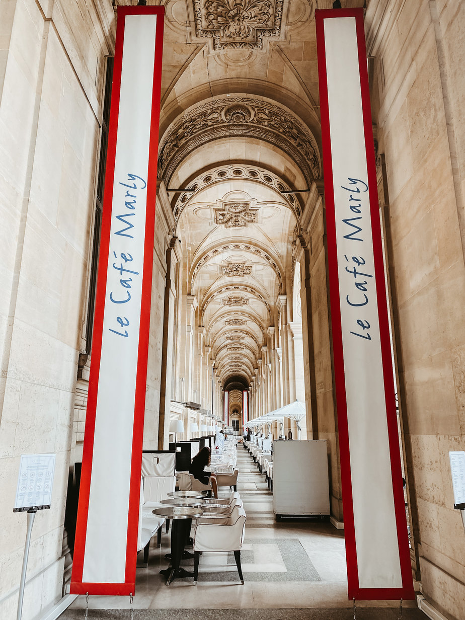 Entrance to Cafe Marly In Paris