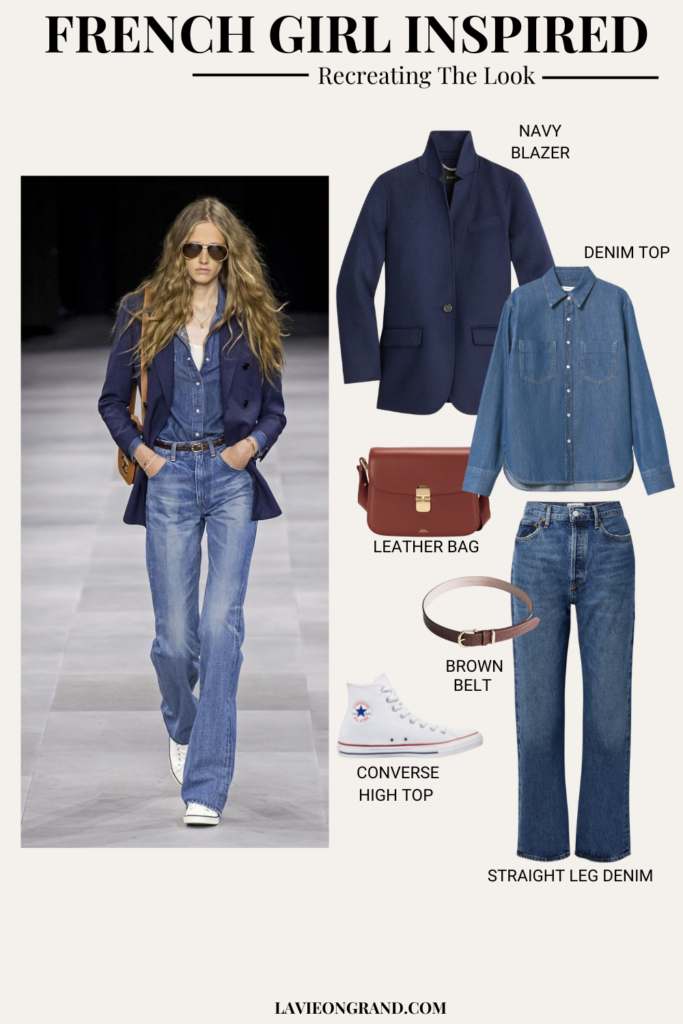 Woman wearing navy blazer with straight leg denim, high top white converse, and brown leather bag