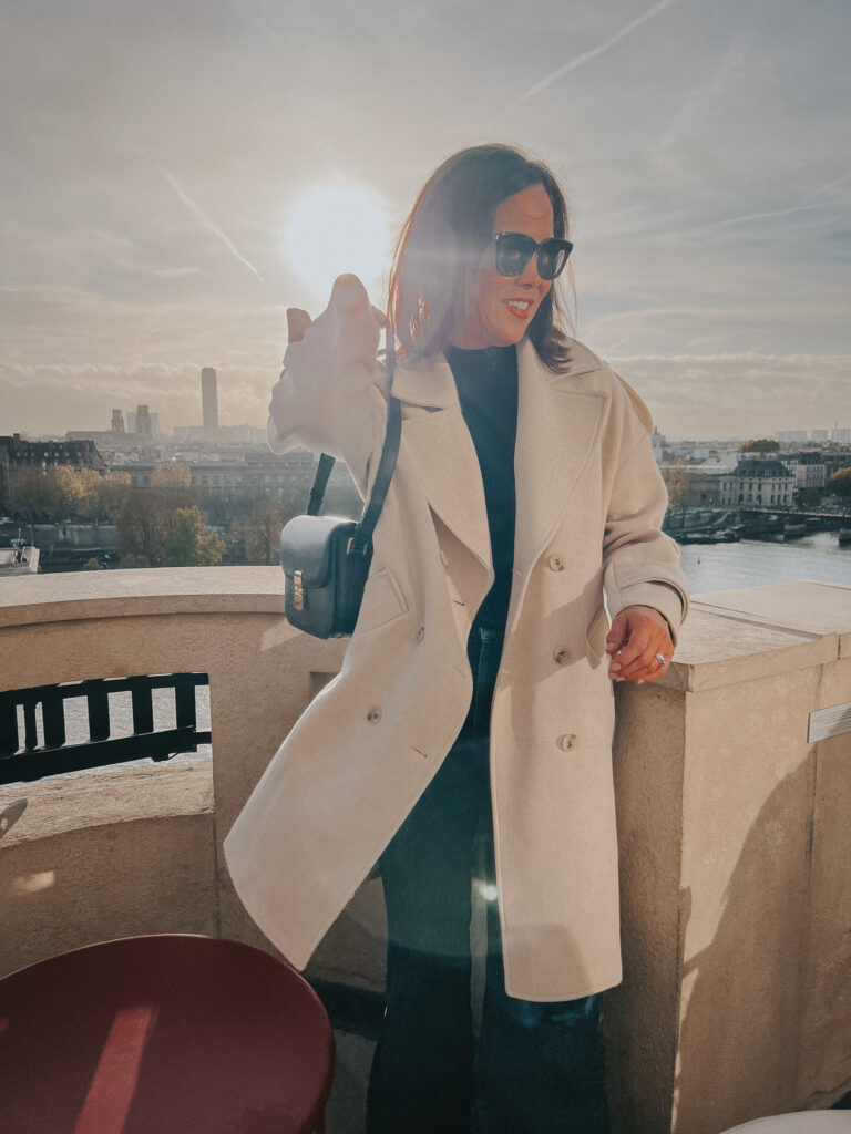 Wearing creme jacket with jeans | French Girl Inspired Winter Coats