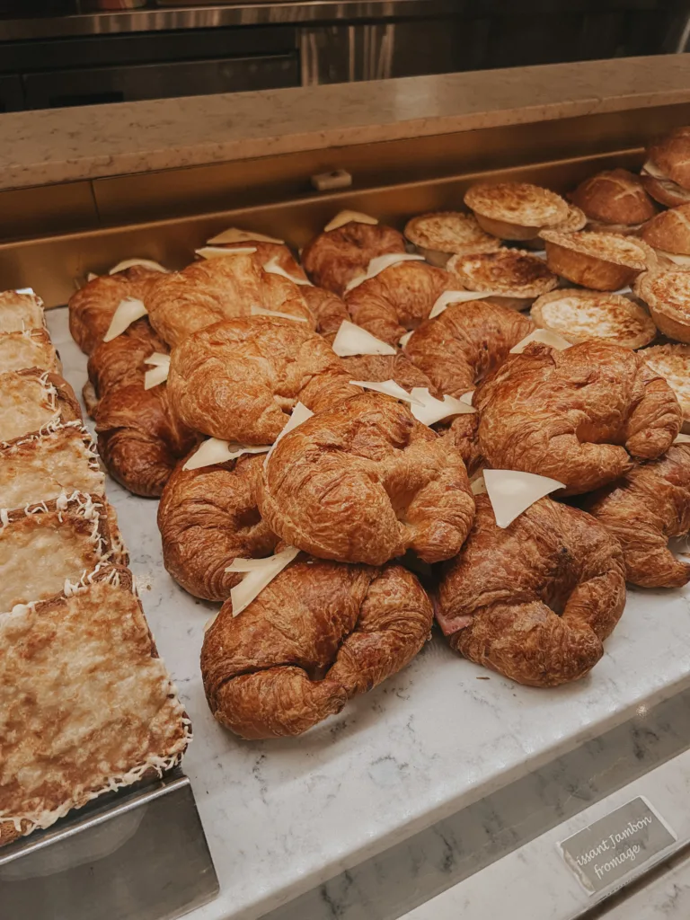 Croissant sandwiches in a case with cheese and ham | French Inspired Things At Disneyworld