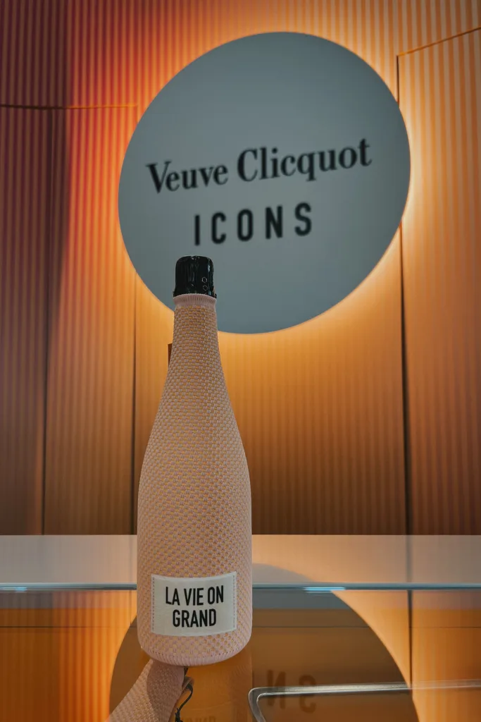 Bottle of Veuve Clicquot champagne on a counter.