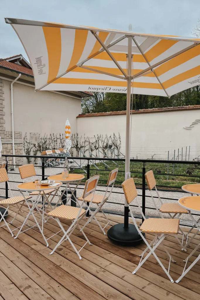 Yellow tables and chairs at Veuve Clicquot.