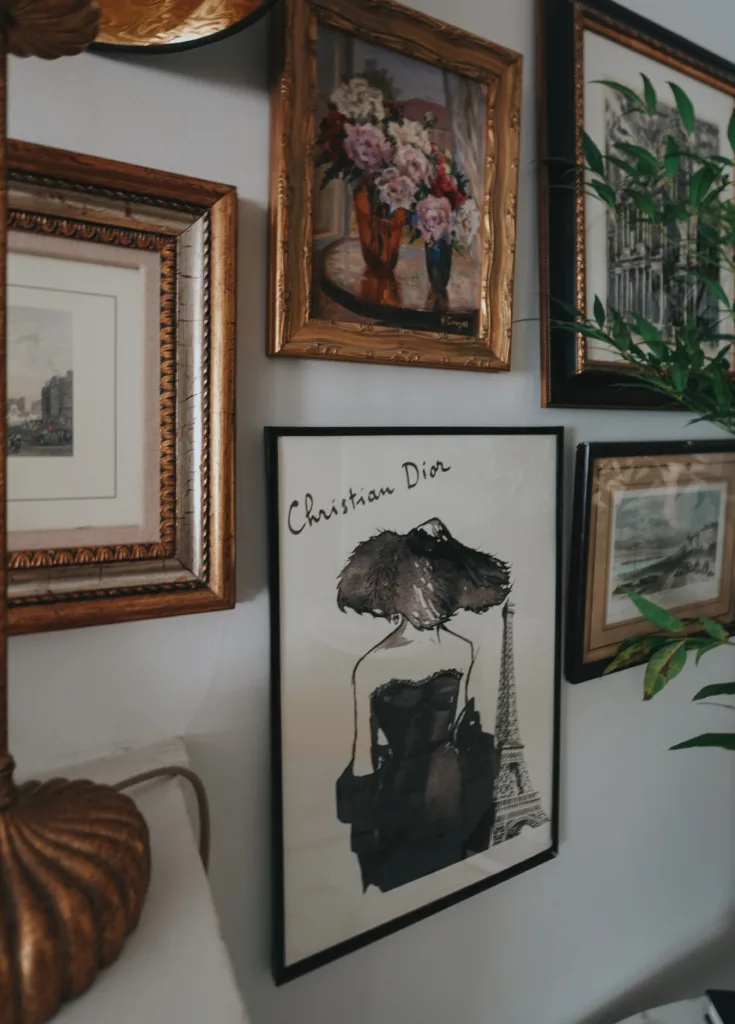 French art on a wall with christian dior poster.