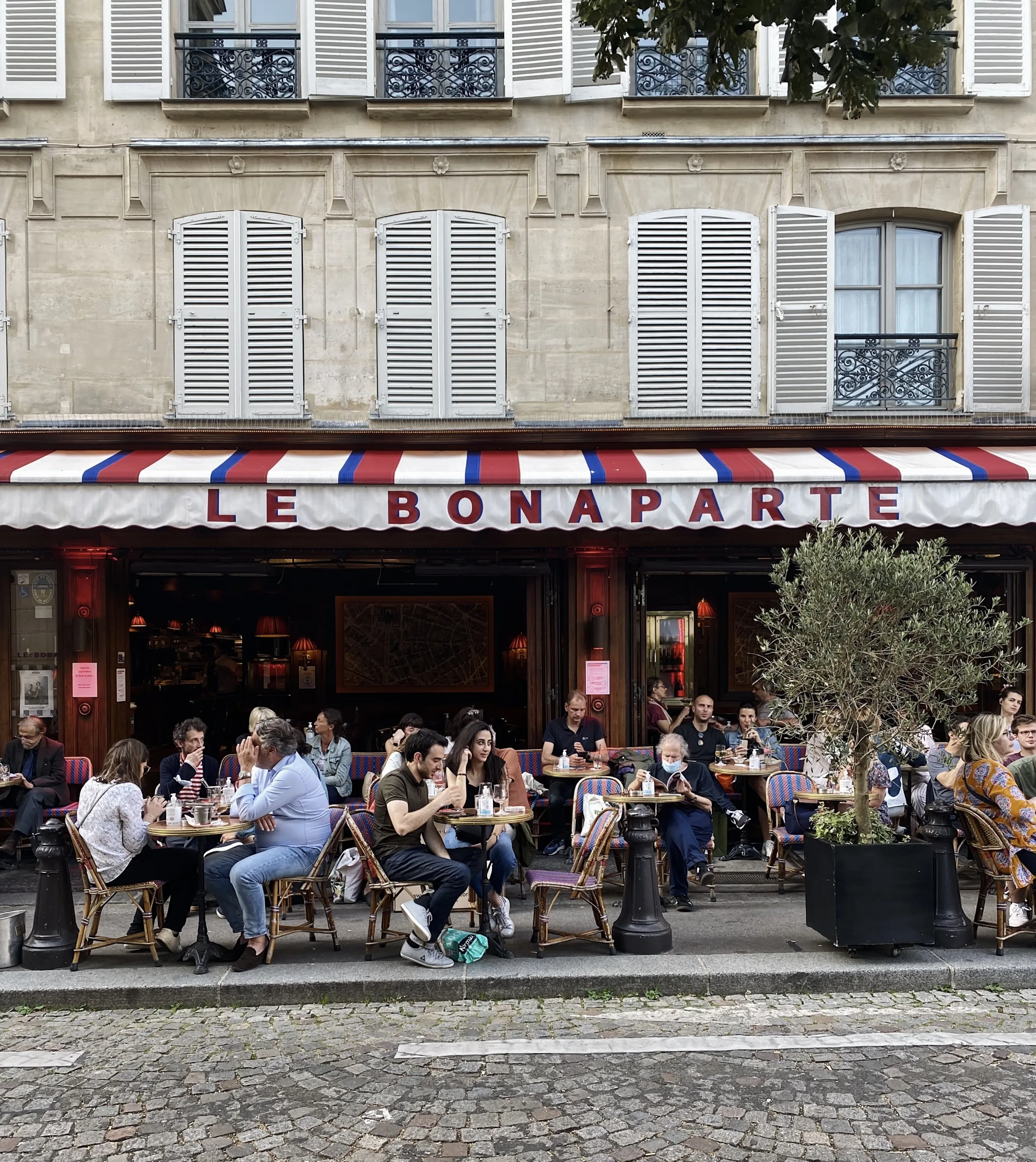 Outside exterior of Le Bonaparte Cafe in Paris.