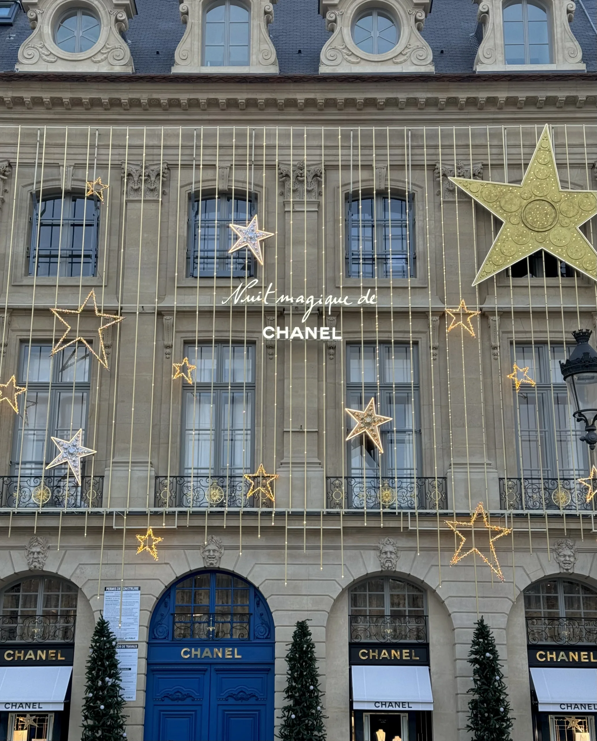 chanel in paris with christmas lights