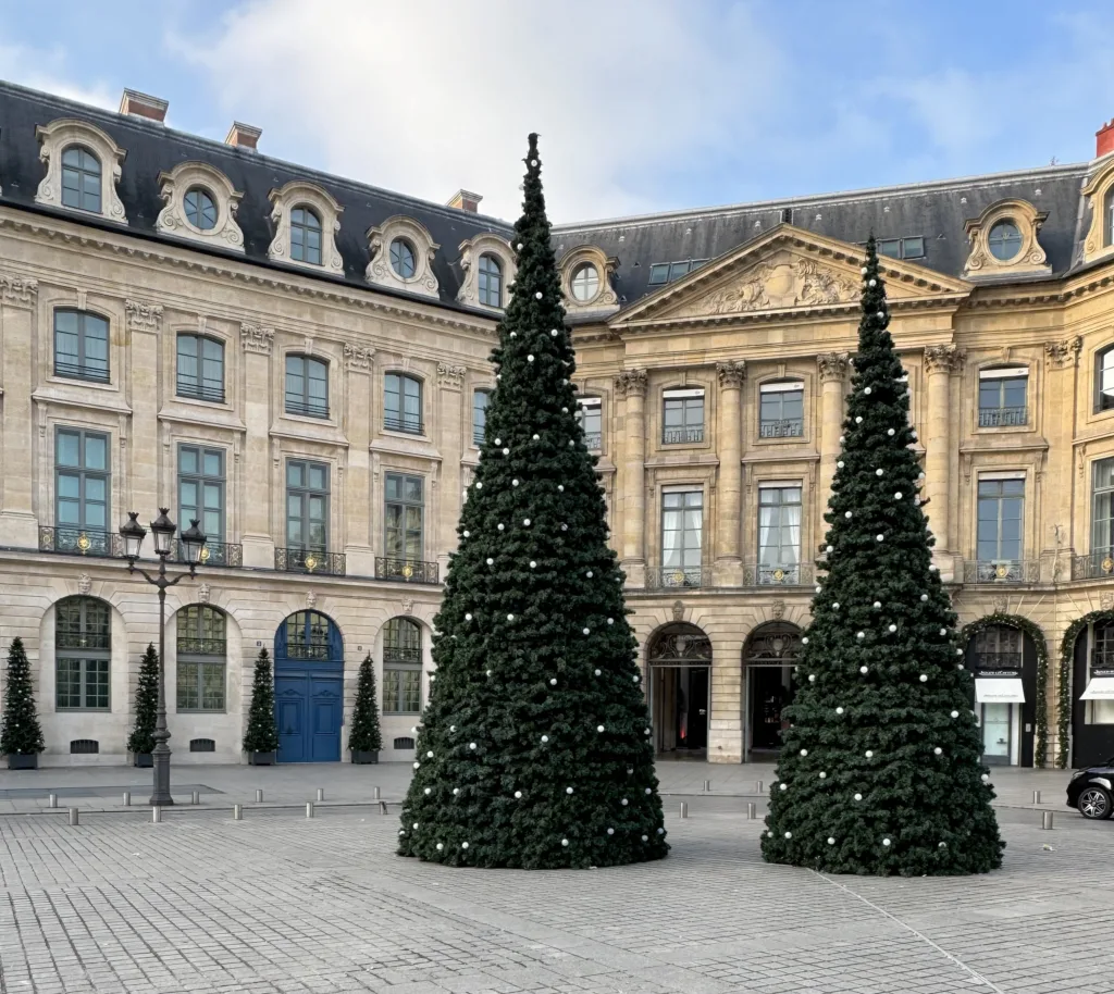 Two trees in middle of Place Vendome in Paris | Where To See Festive Sights In Paris