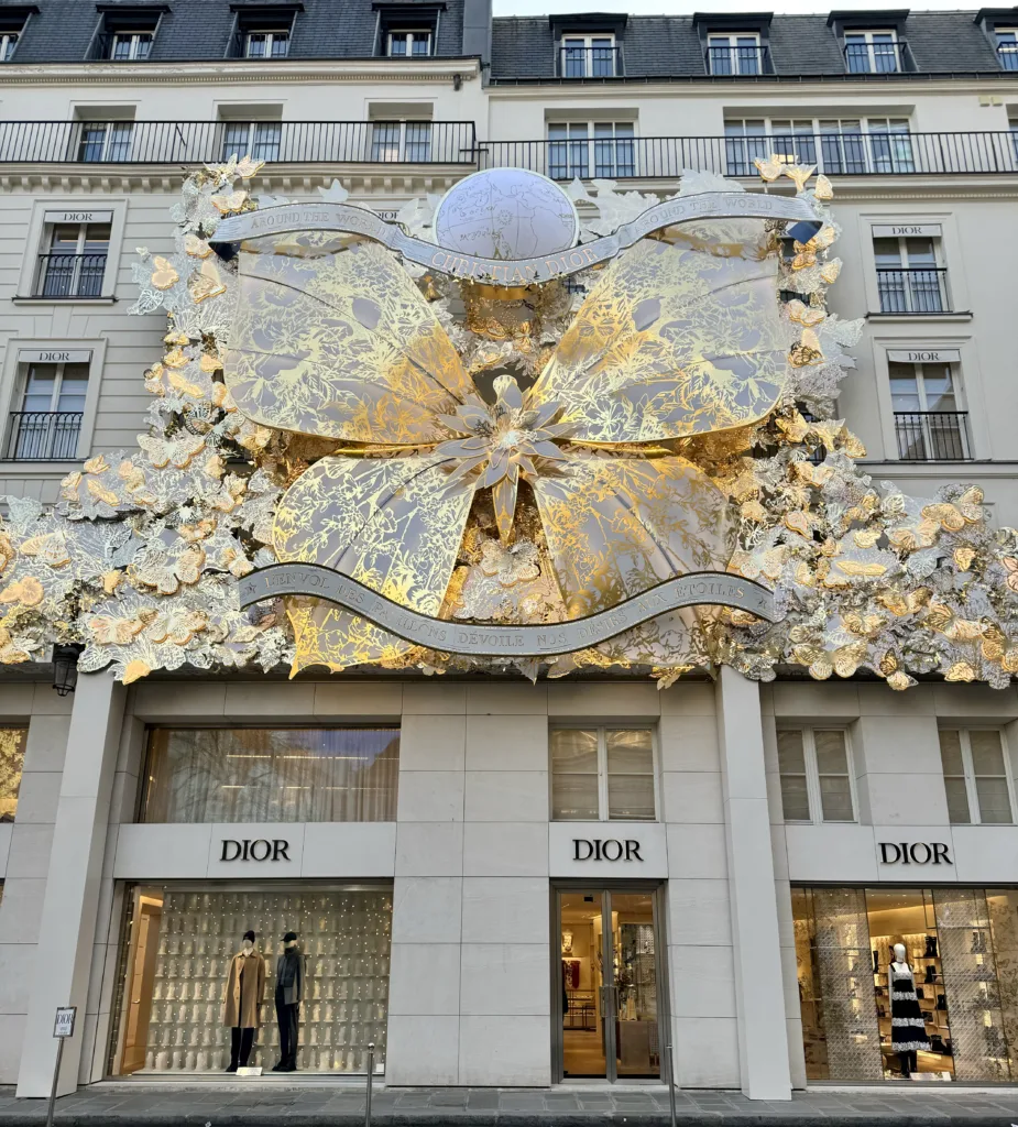 Exterior of Dior in Paris At christmas with gold detail.
