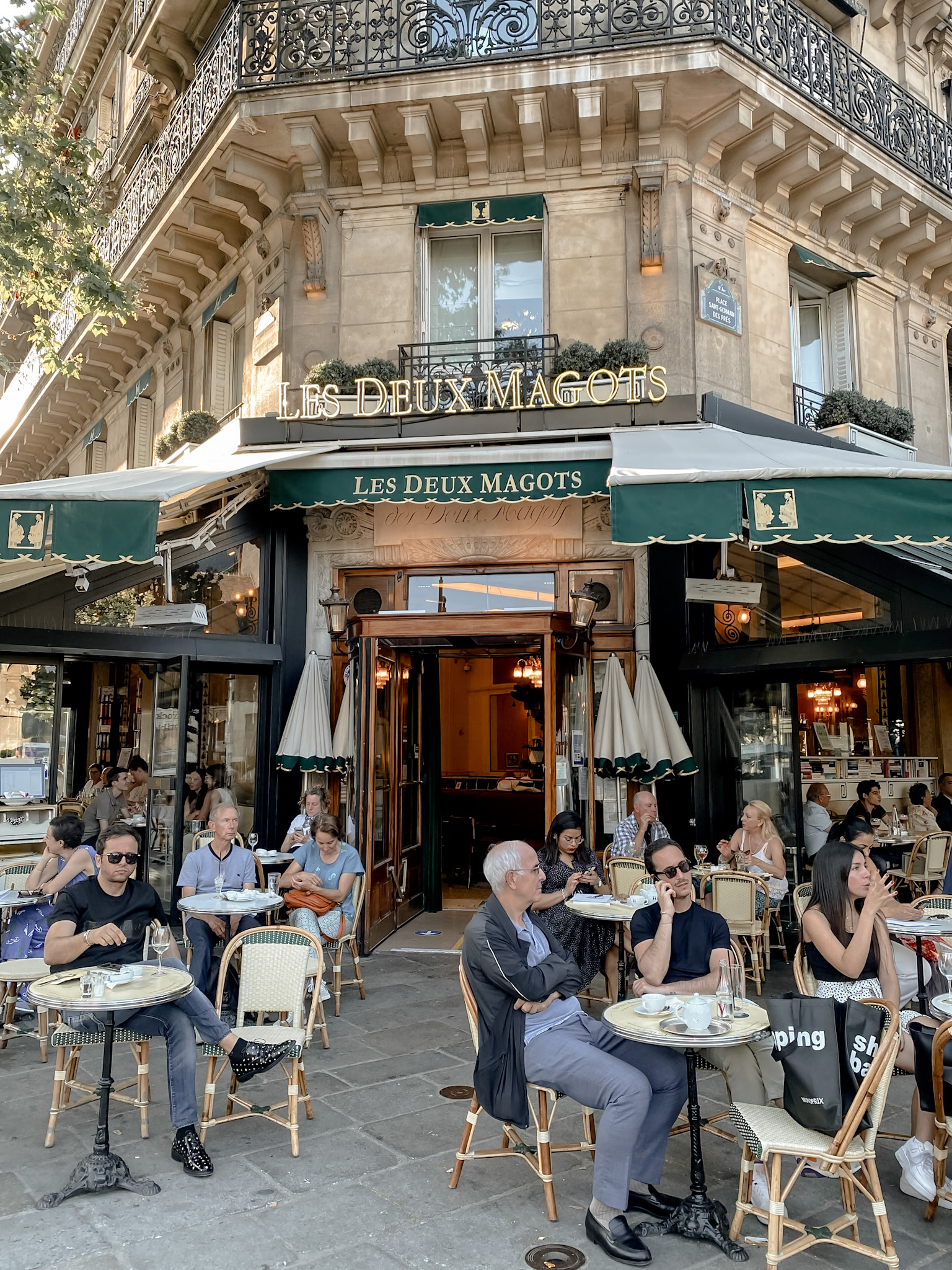 Paris cafƩ culture at Les Deux Magots showing the French way of life and social gatherings