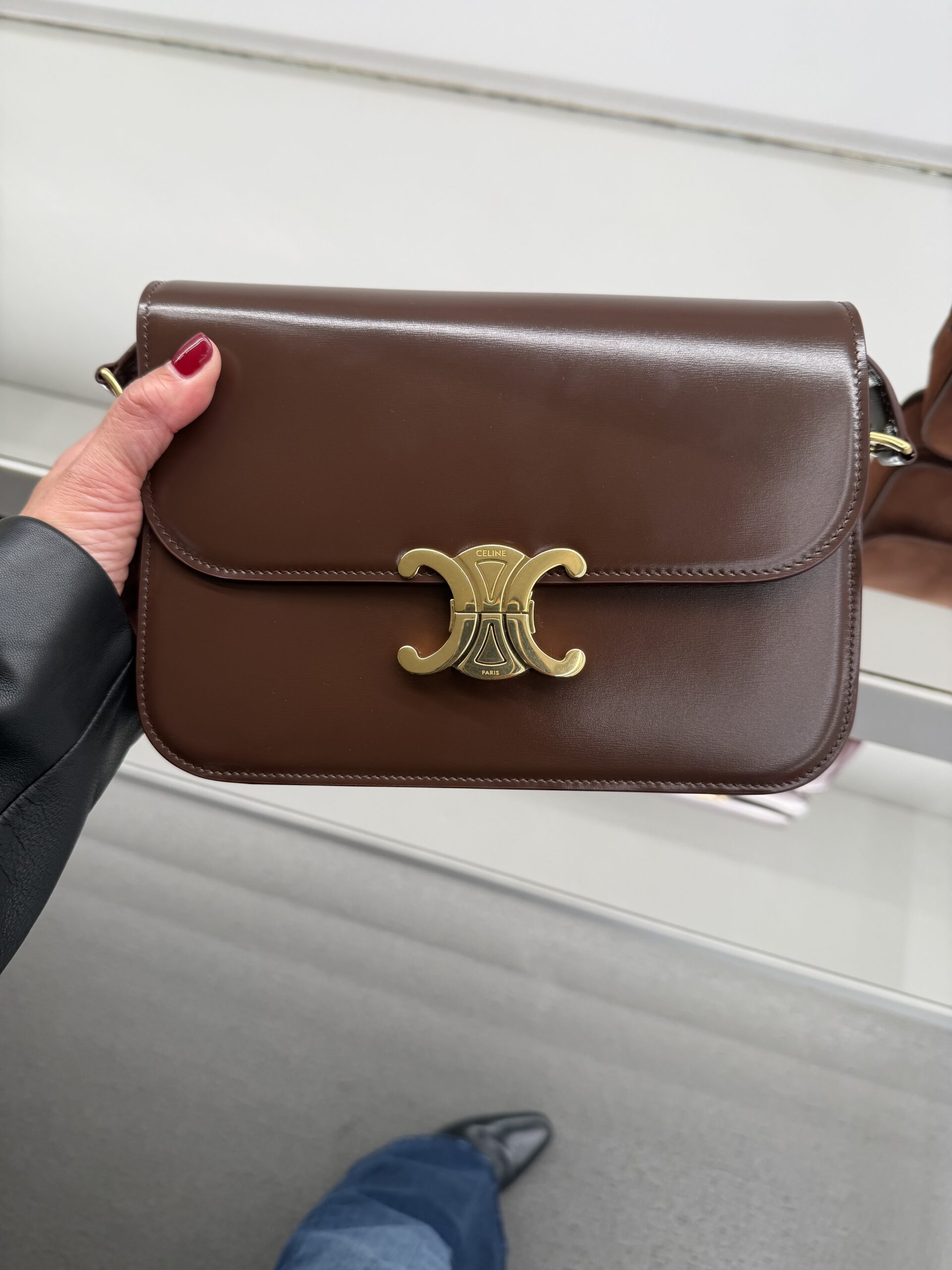 Celine Triomphe bag showcasing clean lines and timeless French fashion