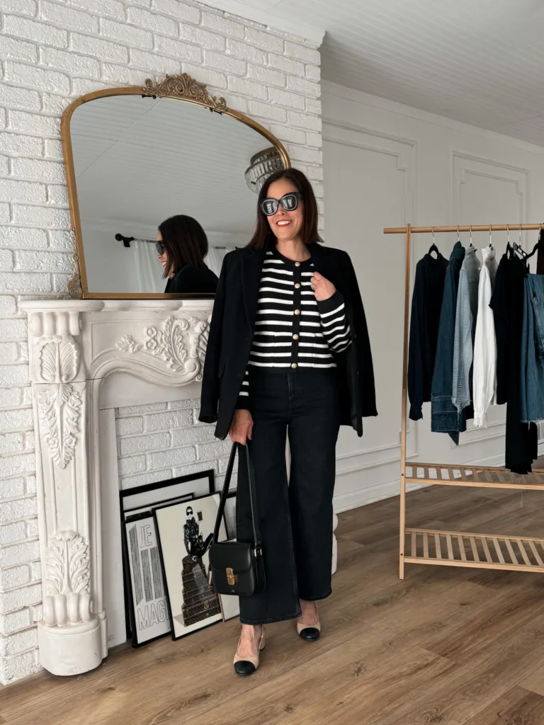Black blazer, stripe sweater, and black pants all outfit ideas for Paris in April.