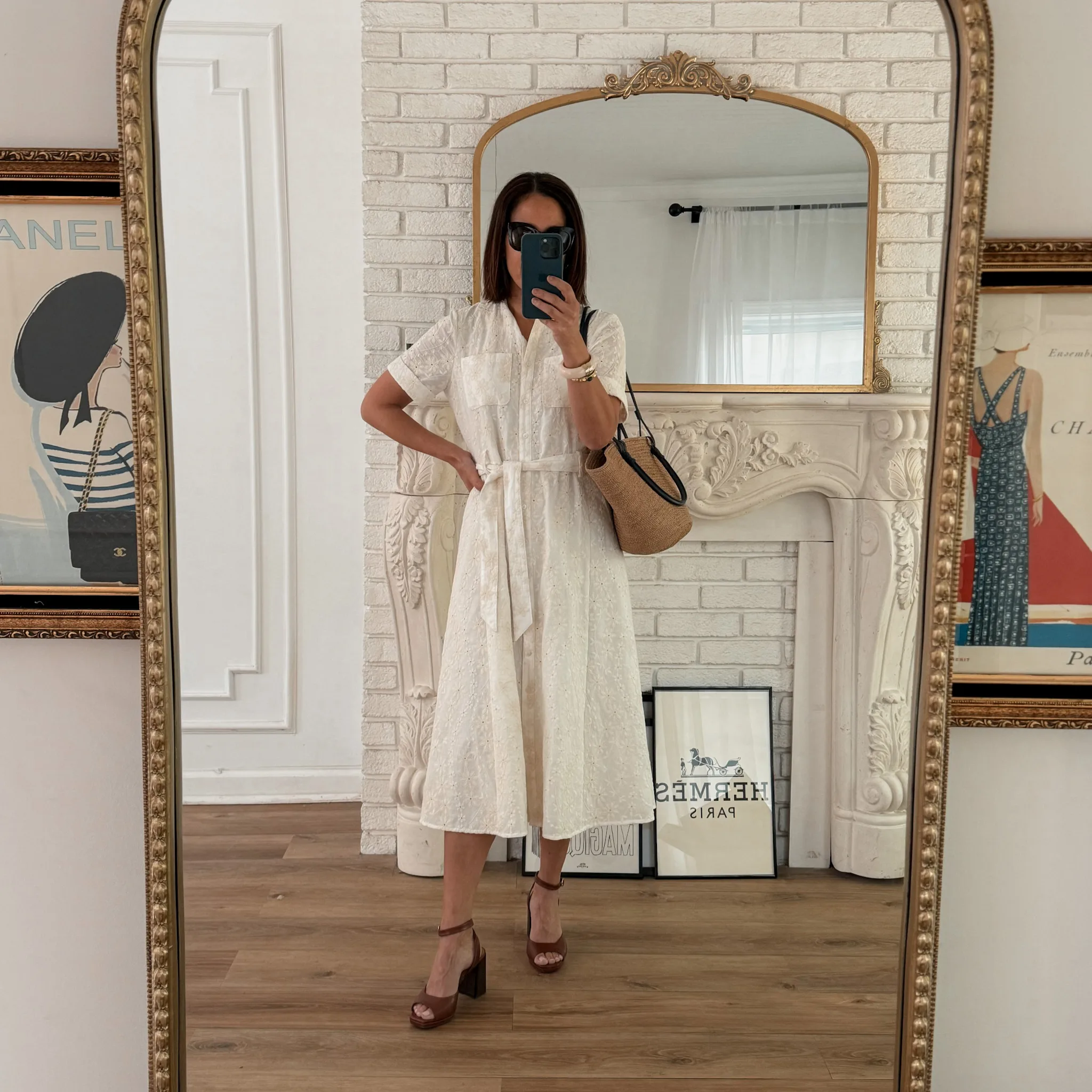 Woman wearing white dress with market bag and sandals | A Guide To Sézane Sizing