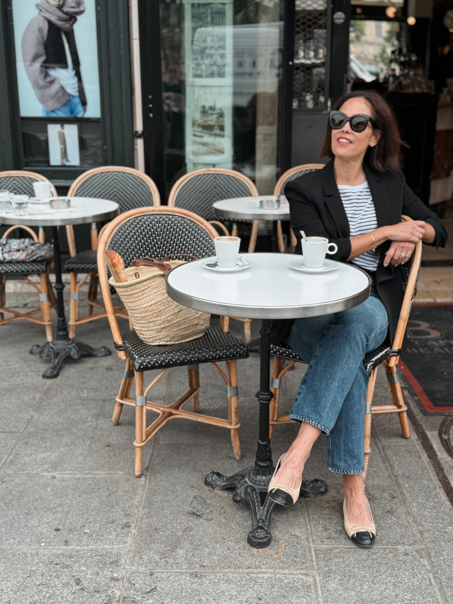 Sitting outdoors cafe in Paris Sitting outdoors at a cafe in Paris.