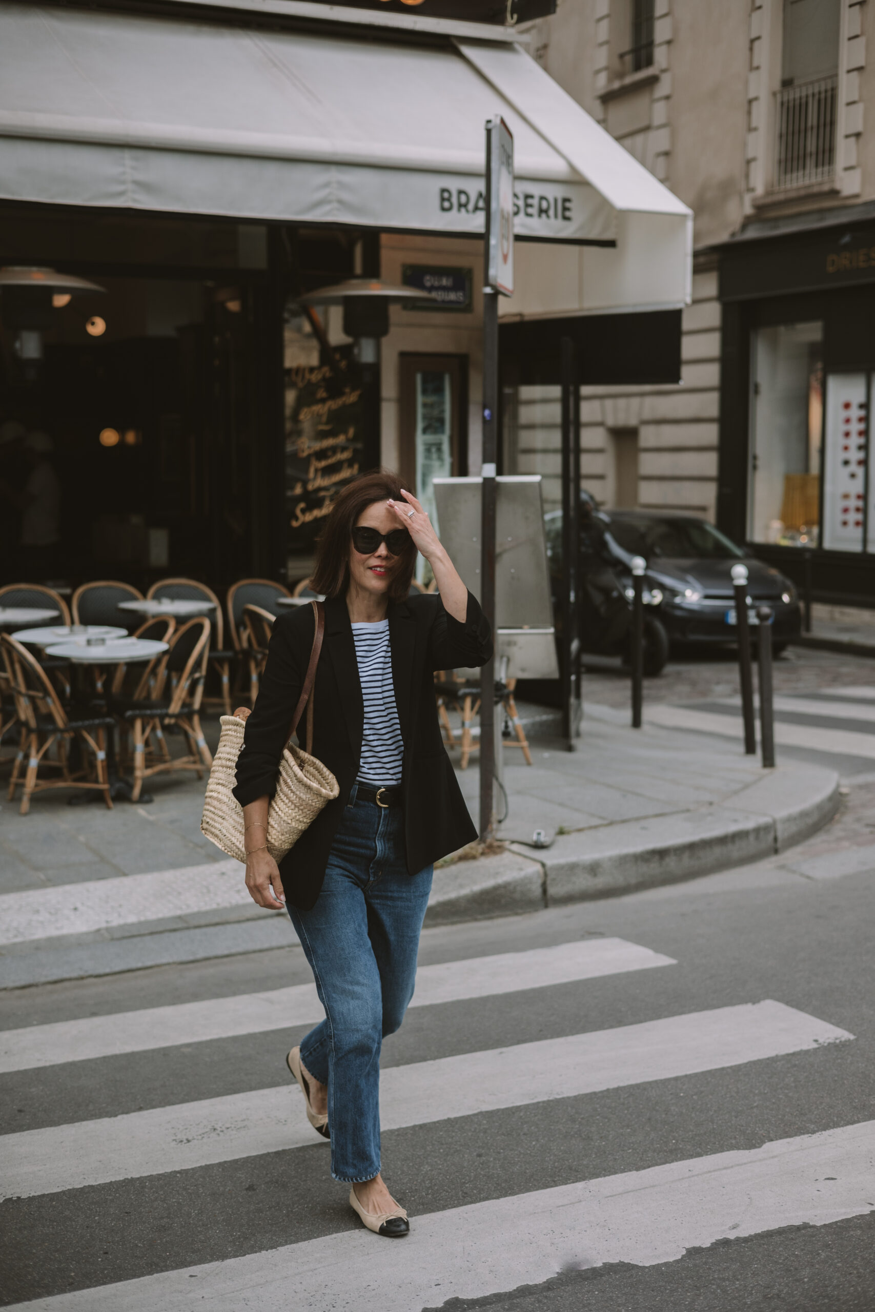 What to wear in Paris for every season. Denim with blazer and stripe top.