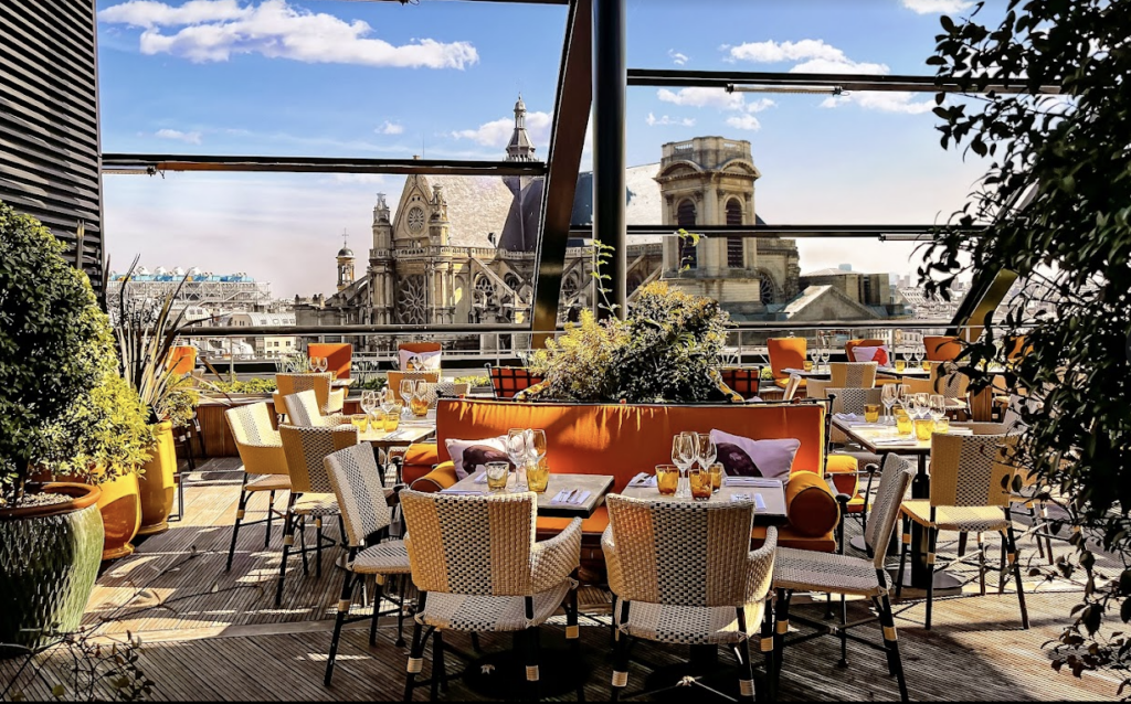 Exterior view of hotel rooftop bar in Paris.