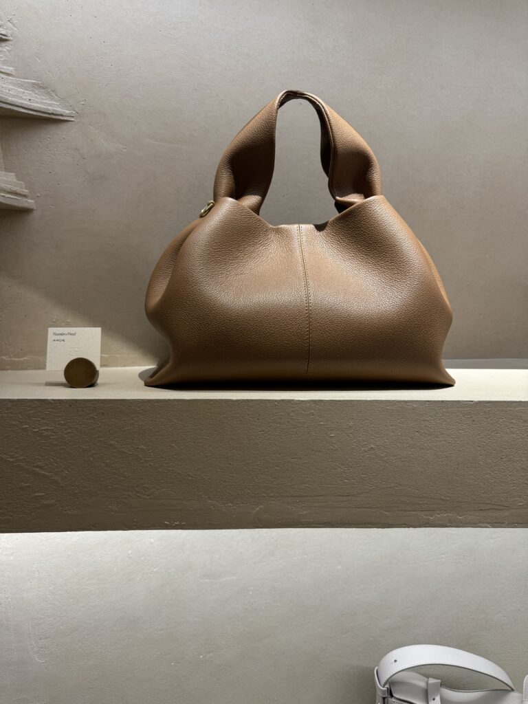 Polene Bag Polene Bag against a wall.