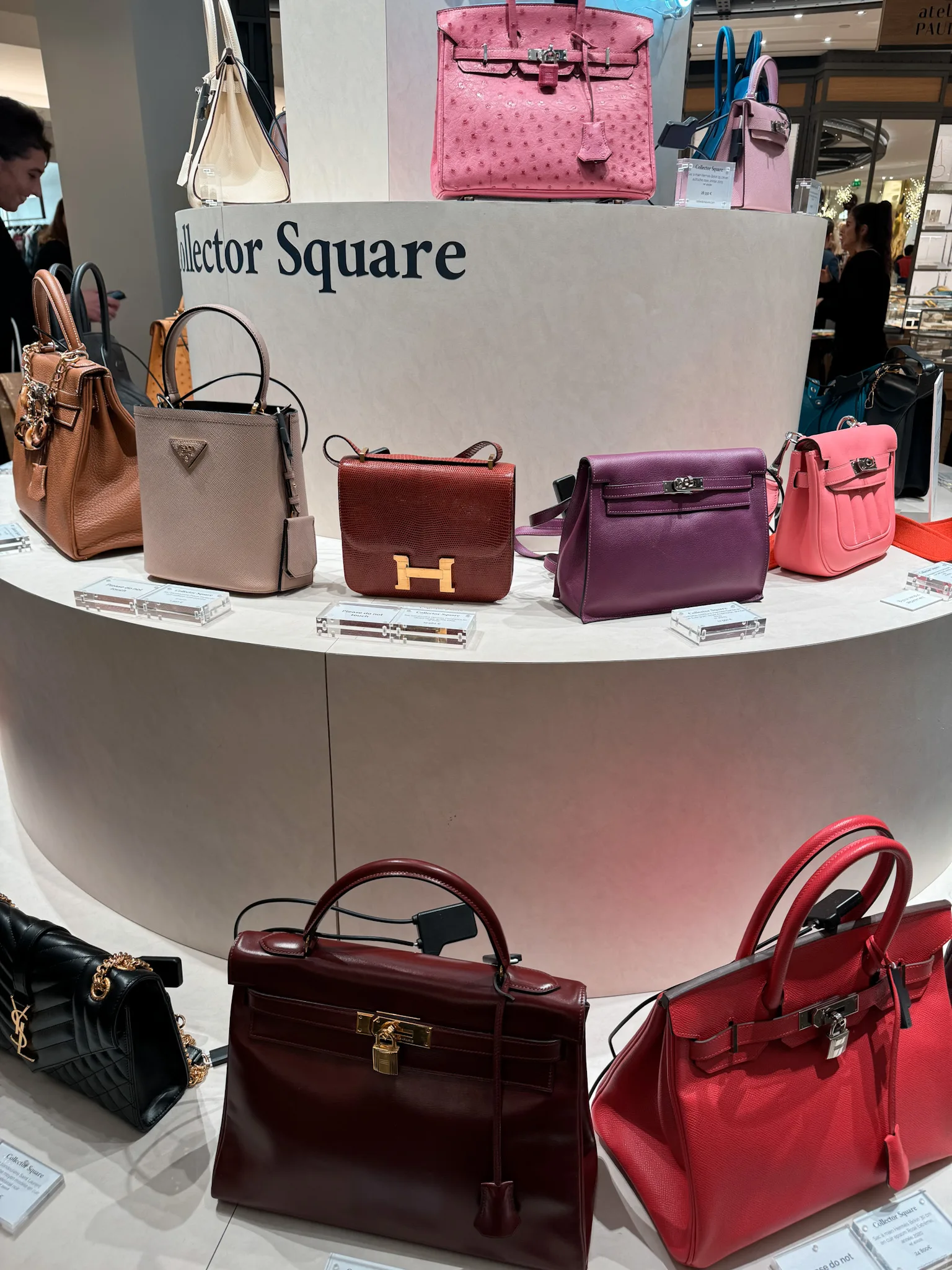 designer bags in Paris on display.