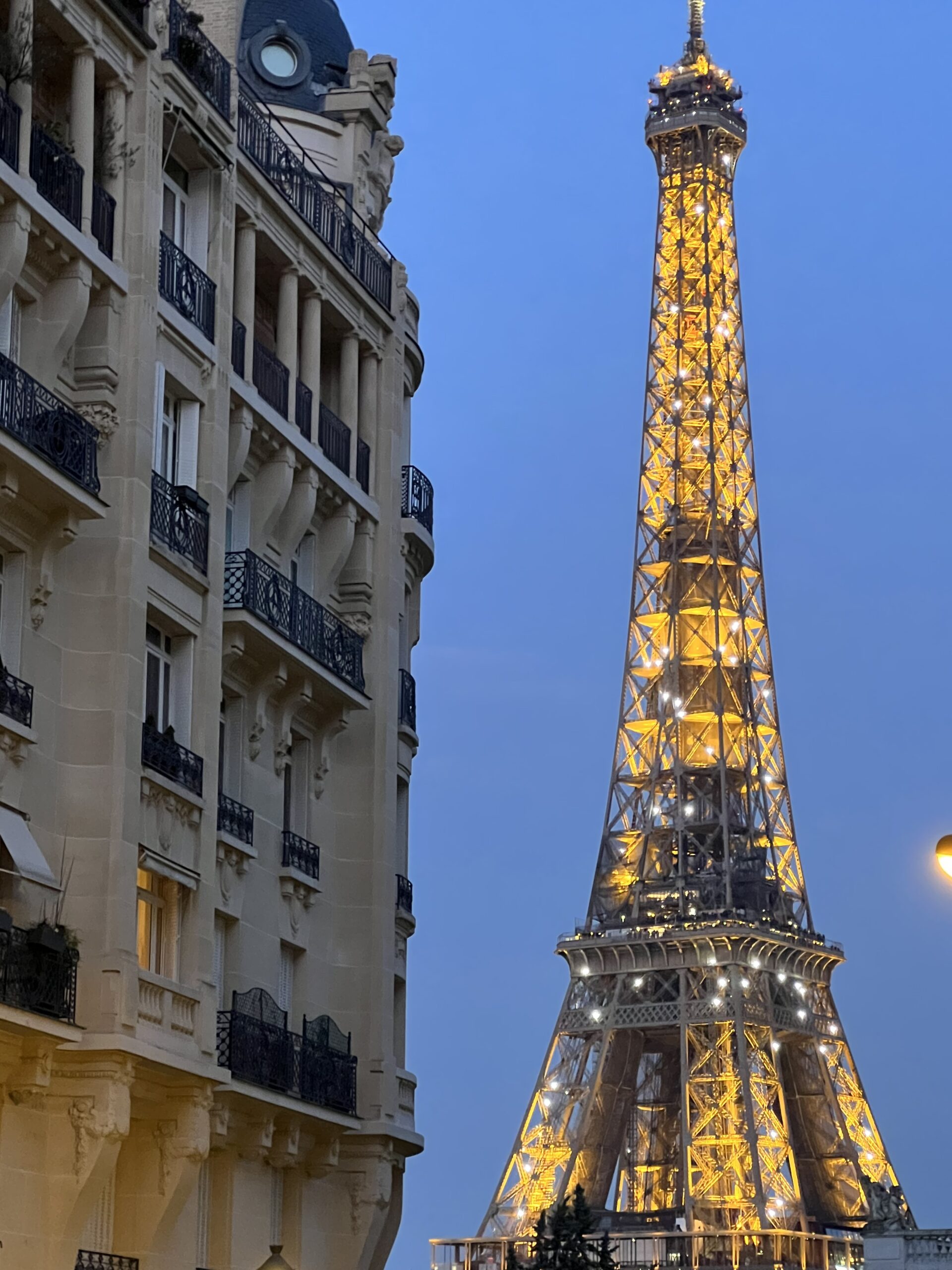 Eiffel Tower sparkling at night.