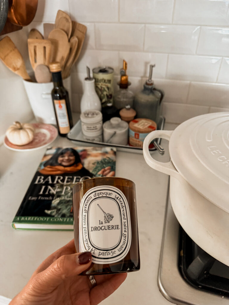 Diptyque candle in kitchen.