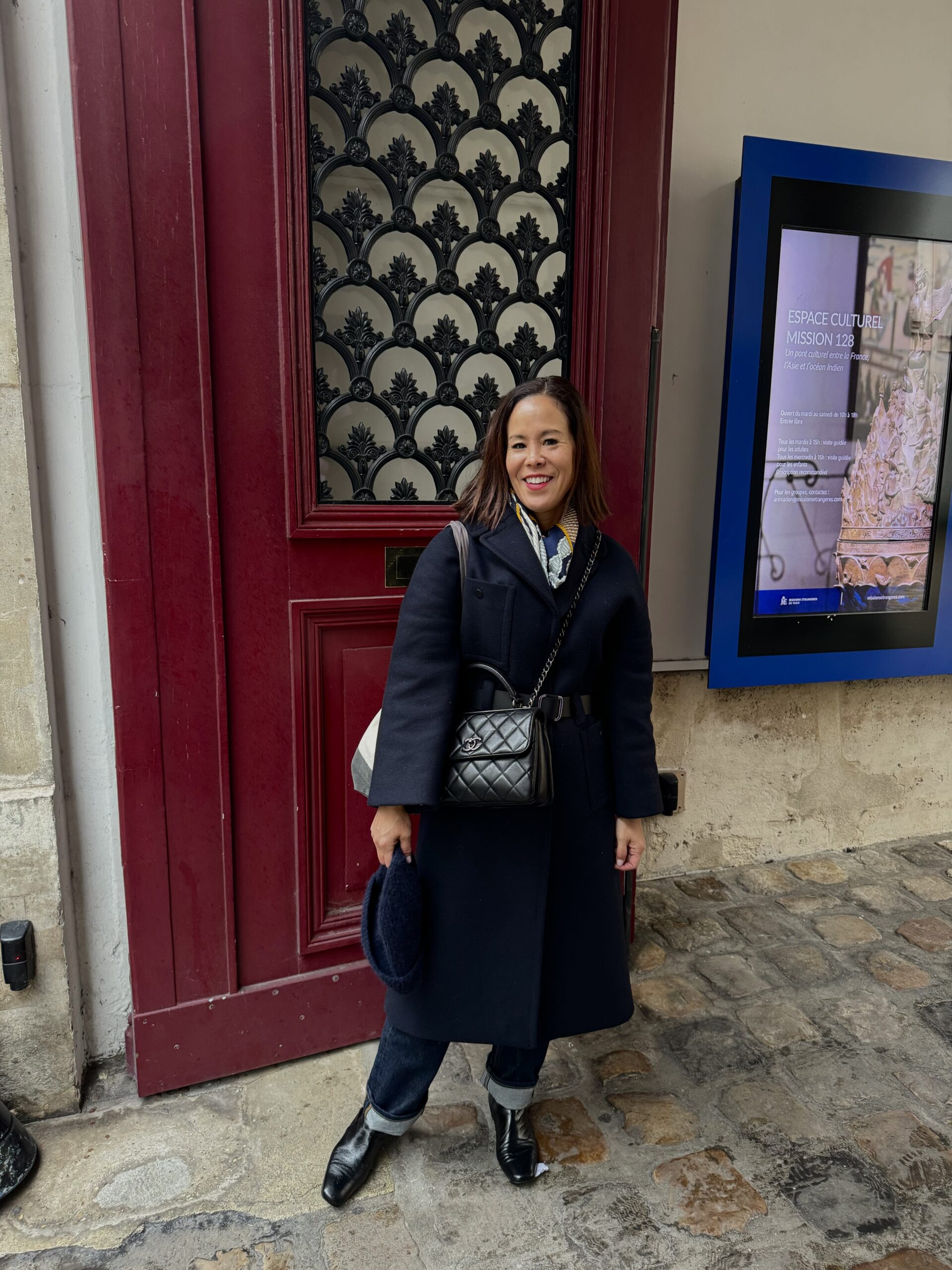 navy coat in Paris in winter Lady with navy coat in Paris in winter