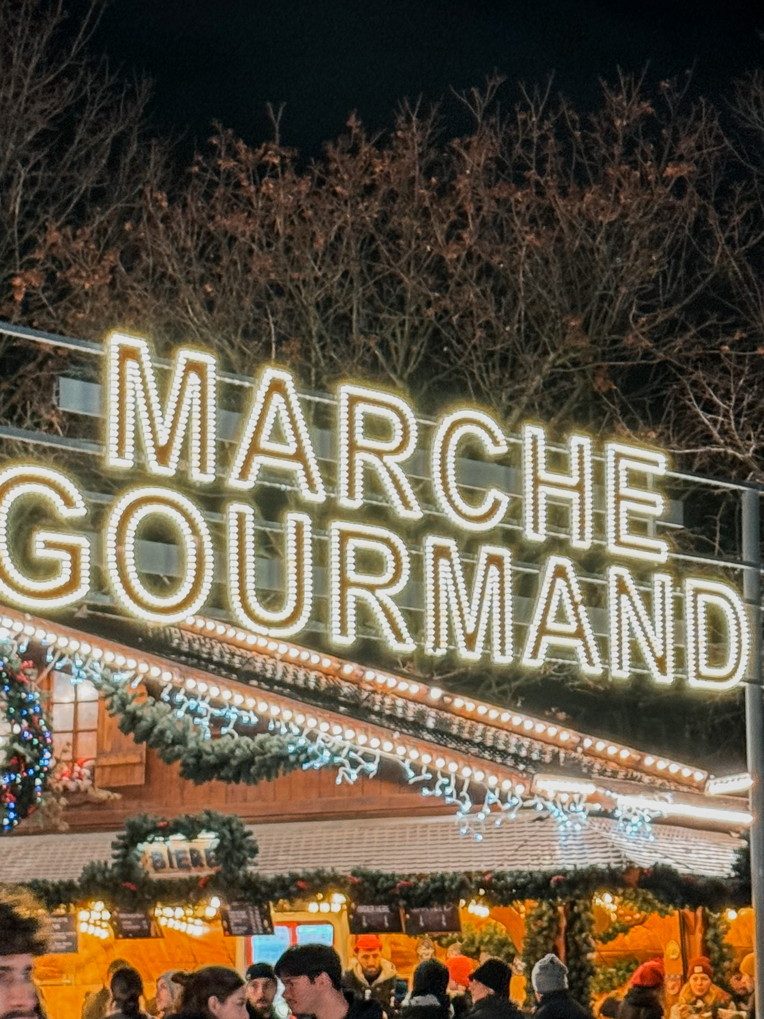 Marche Gourmand sign in Paris at the Tuileries Christmas Market.