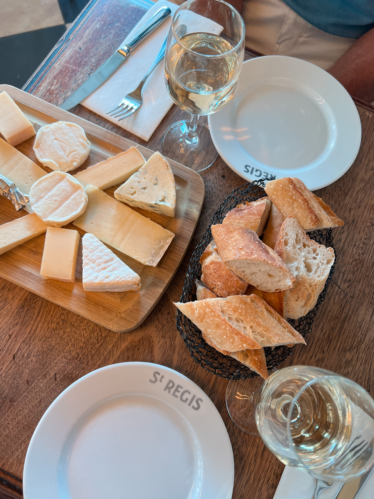 French cheese board Cheese on a table at a cafe, showing how to make a French cheese board.